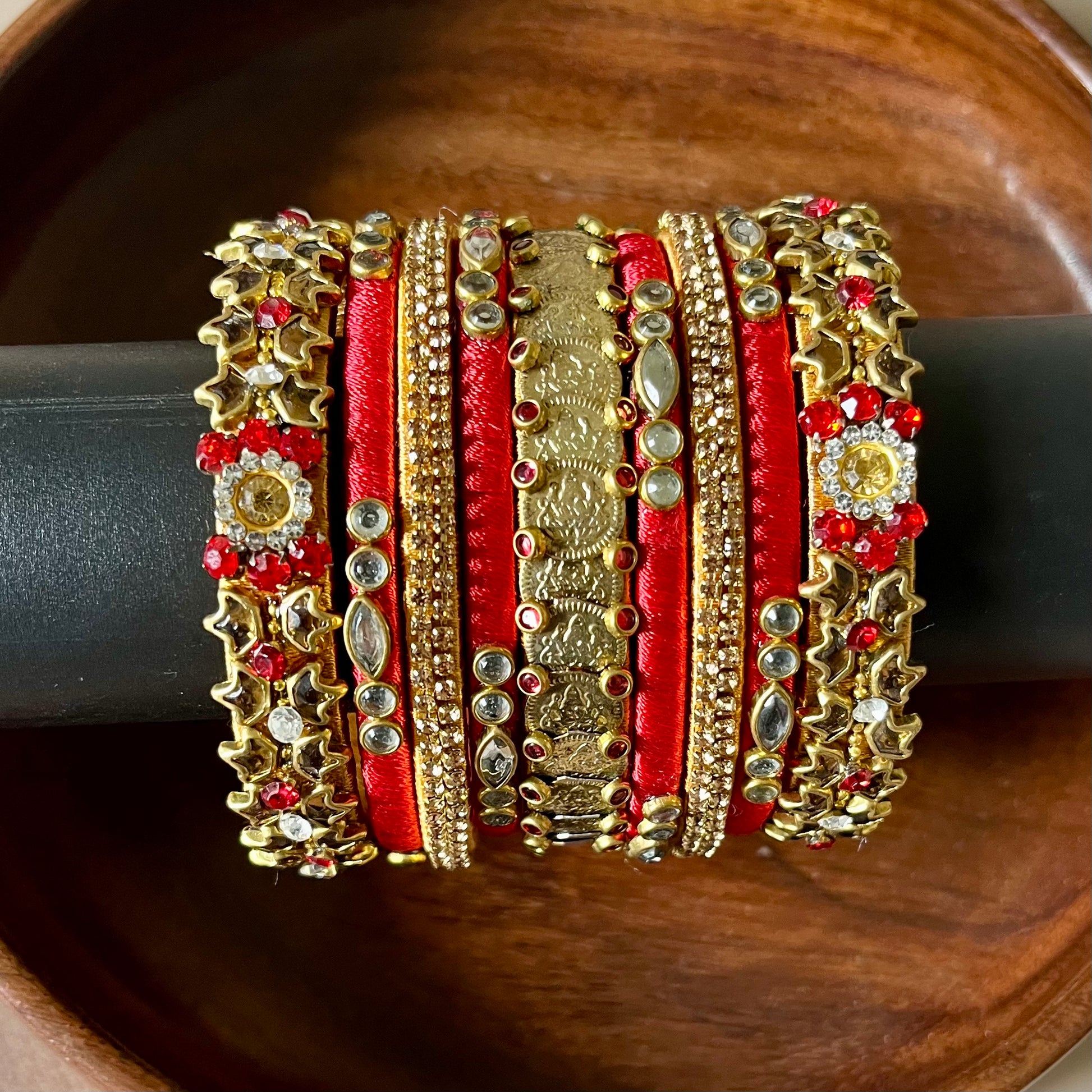 red and gold bangles, bridal bangle set, silk thread bangles, kundan bangles, handmade bangles, traditional bangle set, wedding bangles, Indian bridal jewelry, ethnic bangles, red bangle set, gold bangle set, 9 piece bangle set, festive bangles, designer bangles, Chandrika Charm bangles