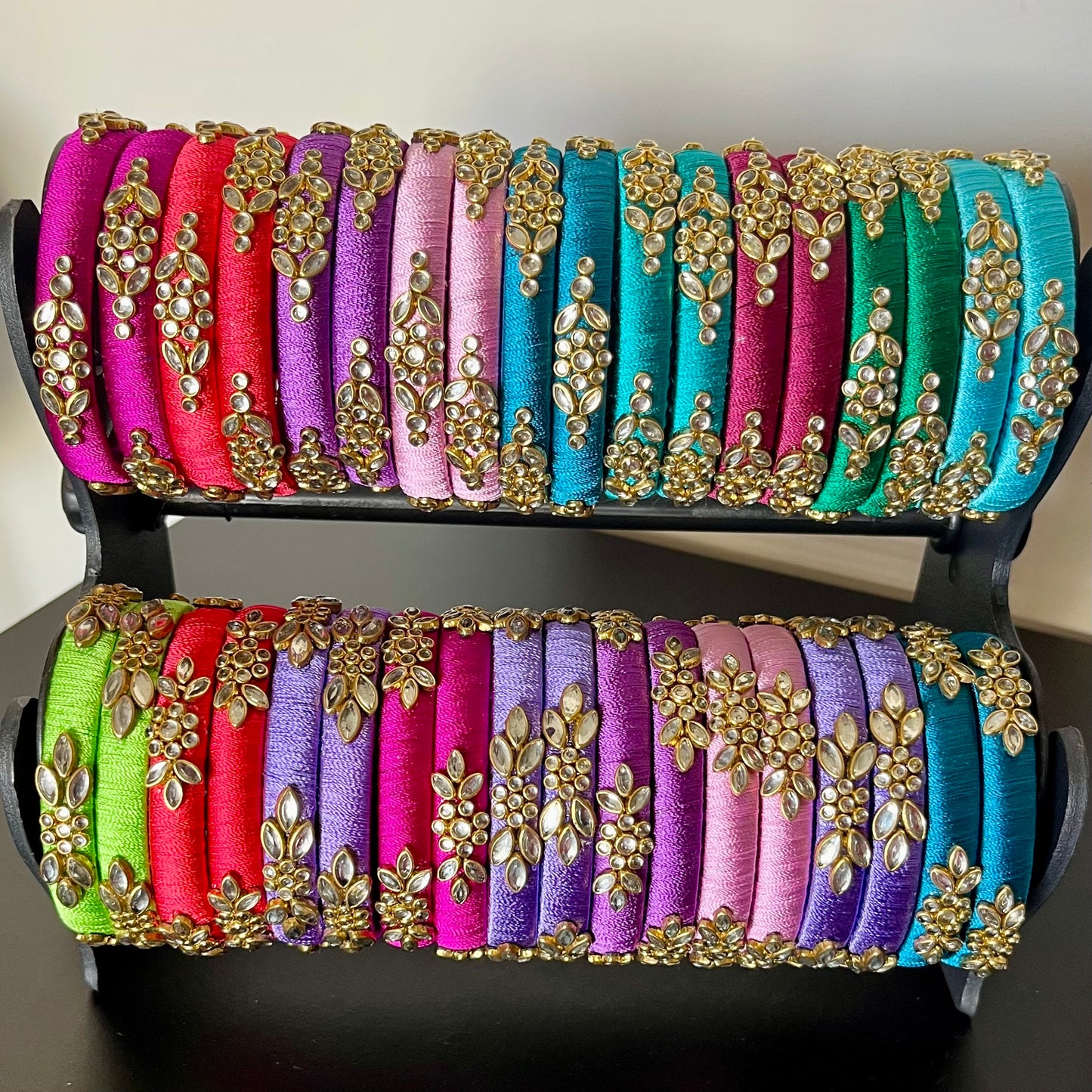 multicolor silk thread bangles, kundan bangles for return gift, traditional silk thread bangles, handmade bangles for women, ethnic bangle set for gifting, return gift bangles online, festive bangles for ladies, wedding return gift ideas, colorful kundan bangles set, pooja return gift bangles, Indian function return gifts, silk thread kundan bangles combo, women’s ethnic wear accessories, handmade return gifts for guests, bridal bangle gift set