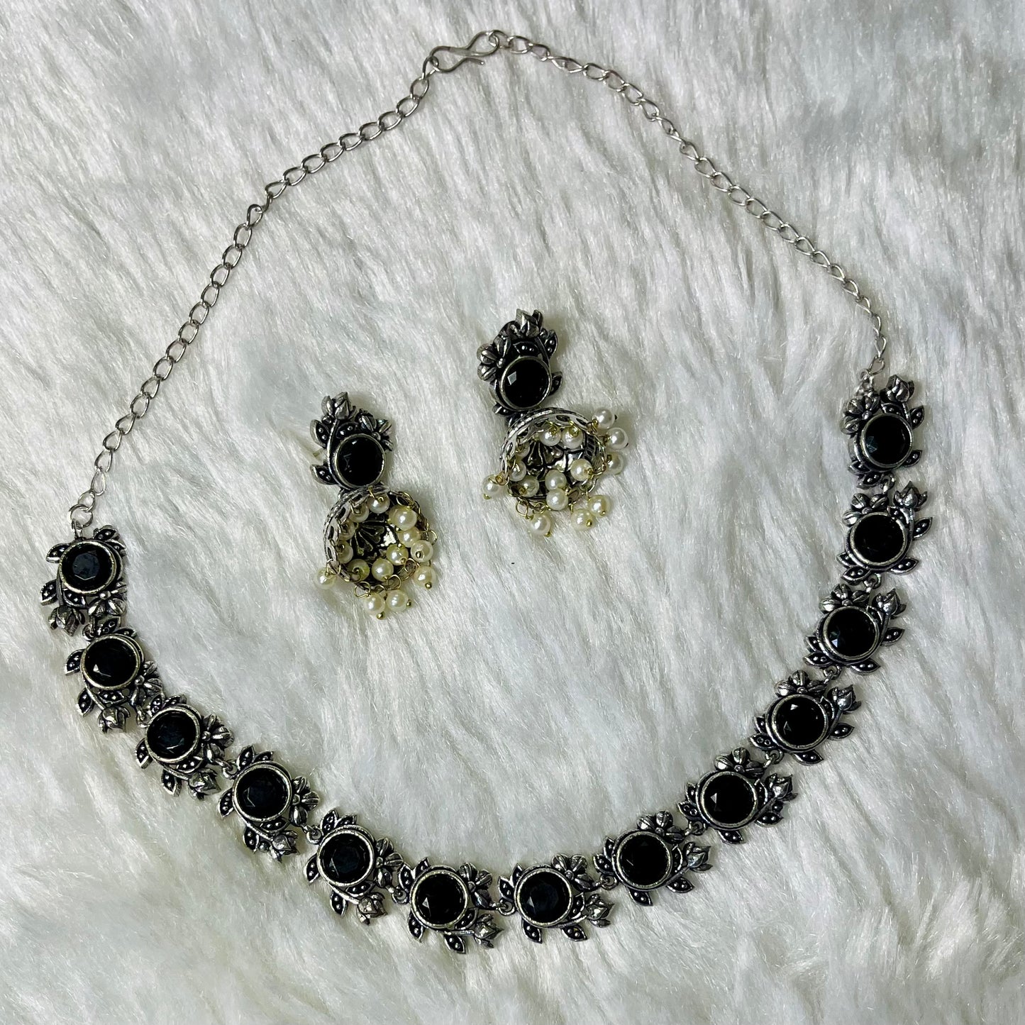 oxidized jewelry set, black stone necklace, floral oxidized choker, tribal necklace for women, antique finish jewelry, handmade oxidized necklace, ethnic black choker, silver oxidized set, pearl drop earrings, women’s statement jewelry, traditional Indian necklace, oxidized metal jewelry, handcrafted jewelry India, desi accessories, black floral necklace set