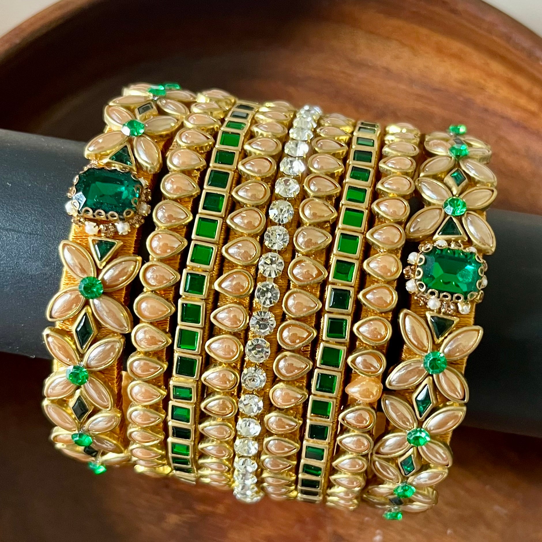 green gold bangle set, kundan bangle set, bridal bangles, traditional bangles, festive bangles, Indian bangle set, emerald bangle set, gold bangles for women, kundan jewelry, wedding bangles, designer bangle set, floral bangles, pearl bangles, handcrafted bangles, ethnic wear accessories, bangle set for saree, bangle set for lehenga, silk thread bangles, bangles for gifting, party wear bangles