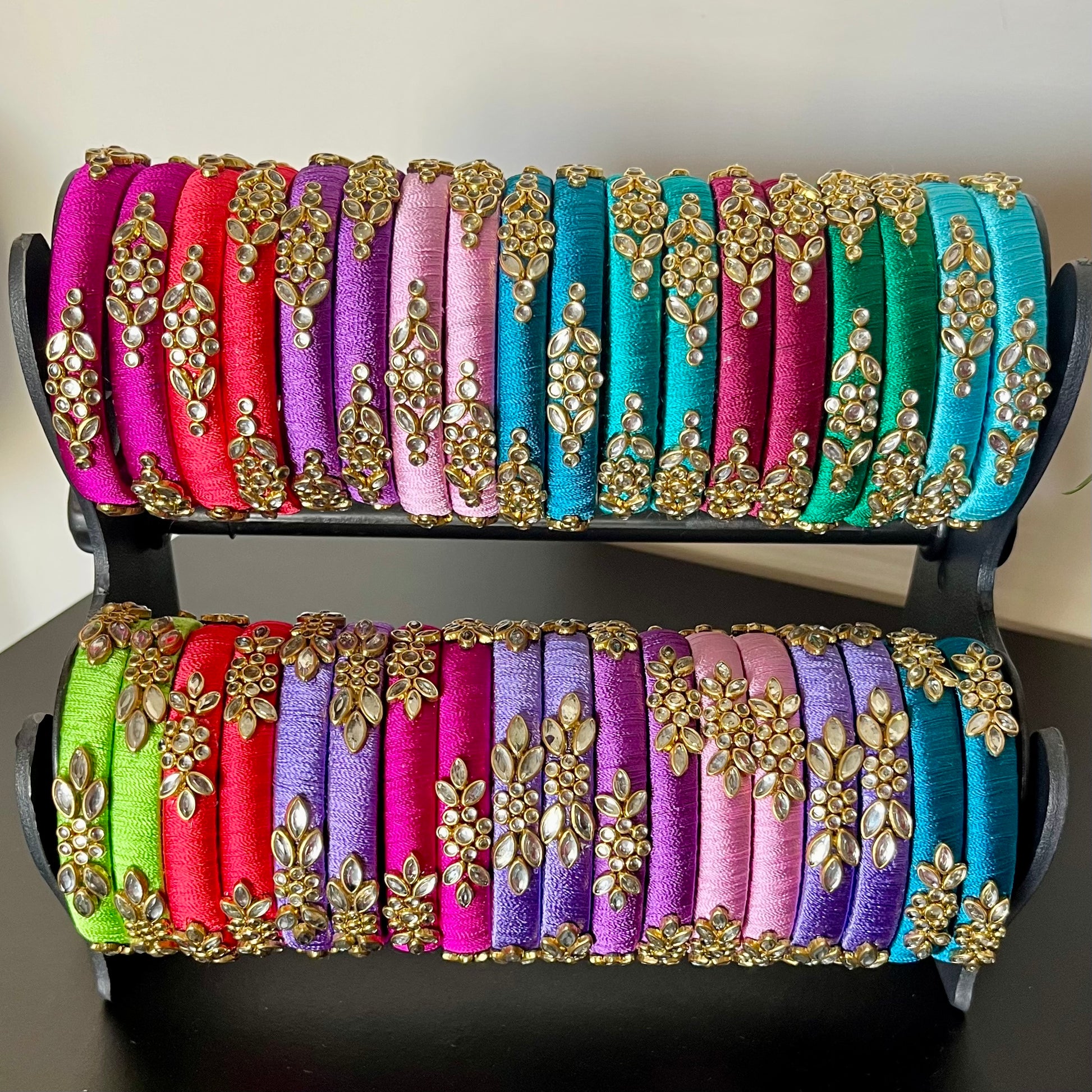 multicolor silk thread bangles, kundan bangles for return gift, traditional silk thread bangles, handmade bangles for women, ethnic bangle set for gifting, return gift bangles online, festive bangles for ladies, wedding return gift ideas, colorful kundan bangles set, pooja return gift bangles, Indian function return gifts, silk thread kundan bangles combo, women’s ethnic wear accessories, handmade return gifts for guests, bridal bangle gift set