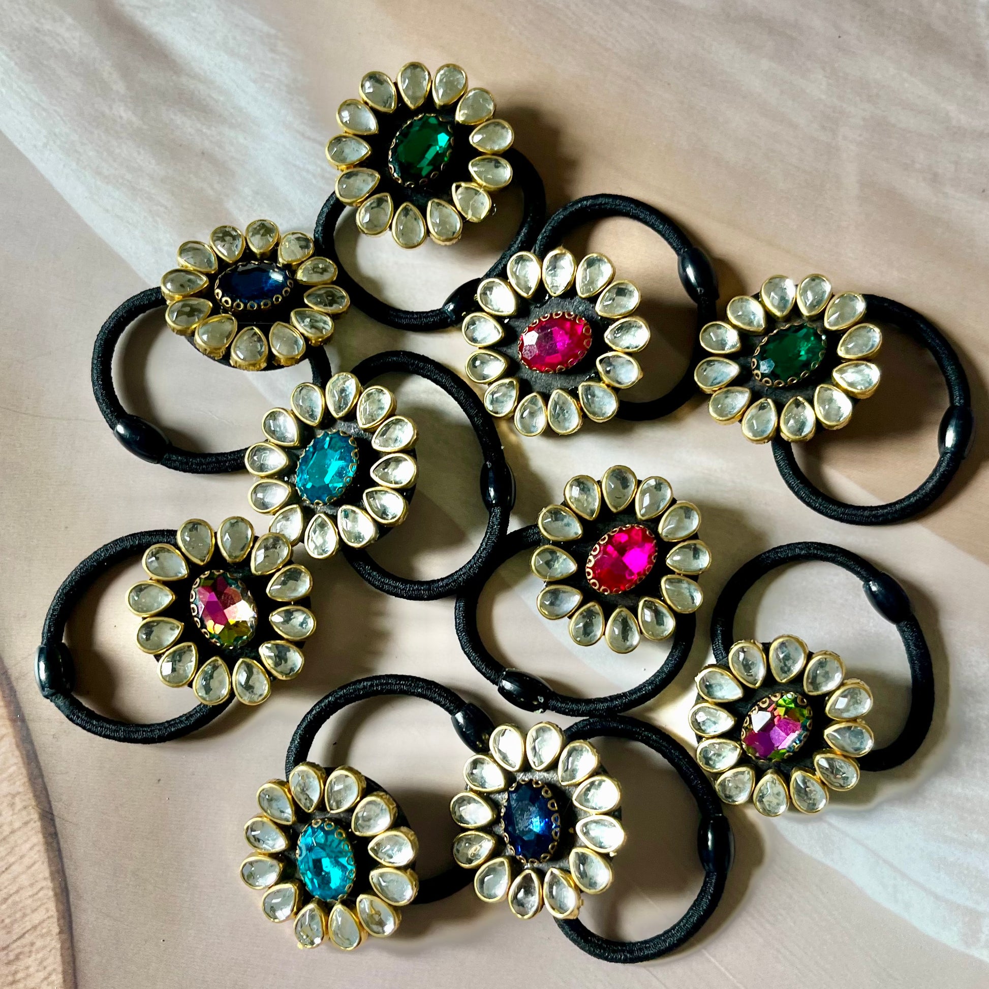 kundan hairbands, embellished hair ties, Indian hair accessories, festive hairbands, traditional hairbands, bridal hair accessories, gemstone hairbands, ethnic hair ties, handmade hairbands, kundan elastic bands, stylish hair accessories, desi hairbands, hairbands for lehenga, hairbands for saree, Indian wedding accessories, kundan jewelry inspired, glam hairbands, ethnic style hairbands, jewel tone hairbands, Kriti Glam Bands