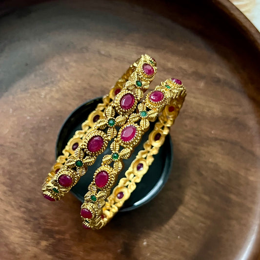 Vintage-Style Gold Bangles with Red and Green Stones