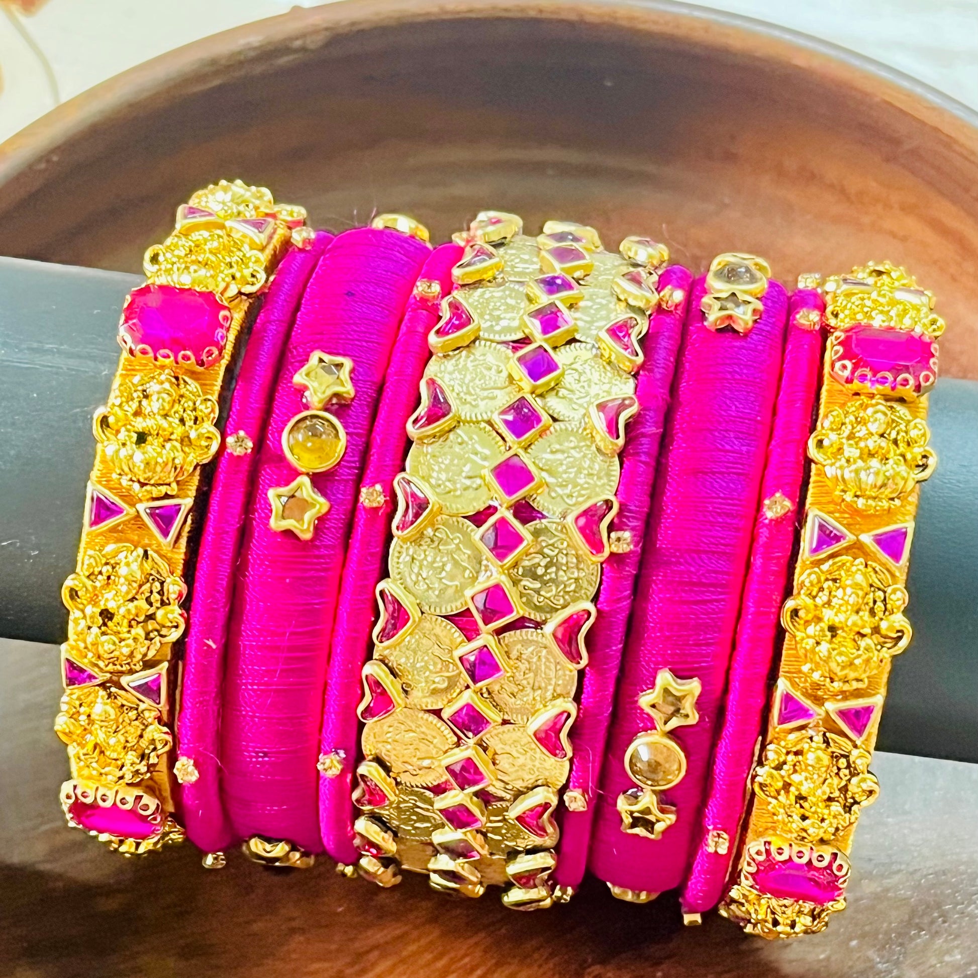 Handmade silk thread bangles, Pink and gold bangle set, Traditional Indian bangles, Designer bangle combo, Ethnic jewelry set, Wedding bangle set, Party wear bangles, Kundan style bangles, Bridal bangles India, Custom bangles Bangalore, Gold plated bangles, Silk thread jewelry, Festive bangles combo, Indian accessories, Ethnic fashion jewelry, Boutique bangles online, Handmade Indian jewelry, Traditional accessories India, Stylish bangles for women, Gold and pink bangles, Vibrant Indian bangles, Bangle stac