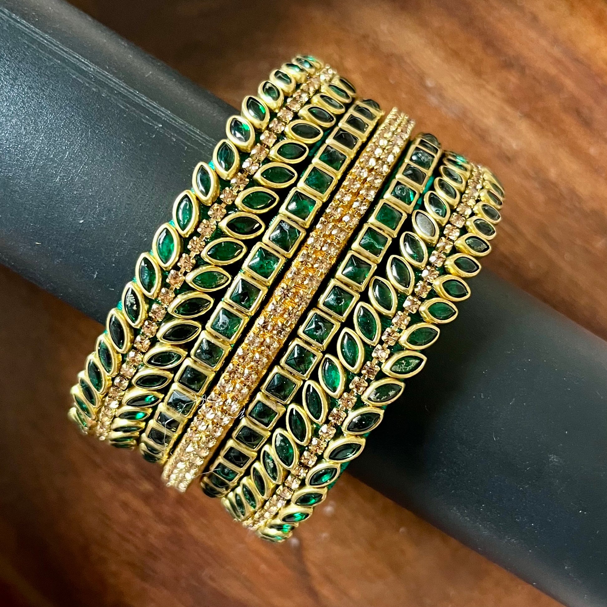 green bangles, gold bangles, bangle set, traditional bangles, Indian bangles, festive jewelry, bridal bangles, emerald bangles, ethnic jewelry, designer bangles, wedding accessories, party wear bangles, handmade bangles, stone bangles, jewelry for saree