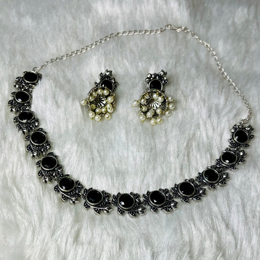 oxidized jewelry set, black stone necklace, floral oxidized choker, tribal necklace for women, antique finish jewelry, handmade oxidized necklace, ethnic black choker, silver oxidized set, pearl drop earrings, women’s statement jewelry, traditional Indian necklace, oxidized metal jewelry, handcrafted jewelry India, desi accessories, black floral necklace set