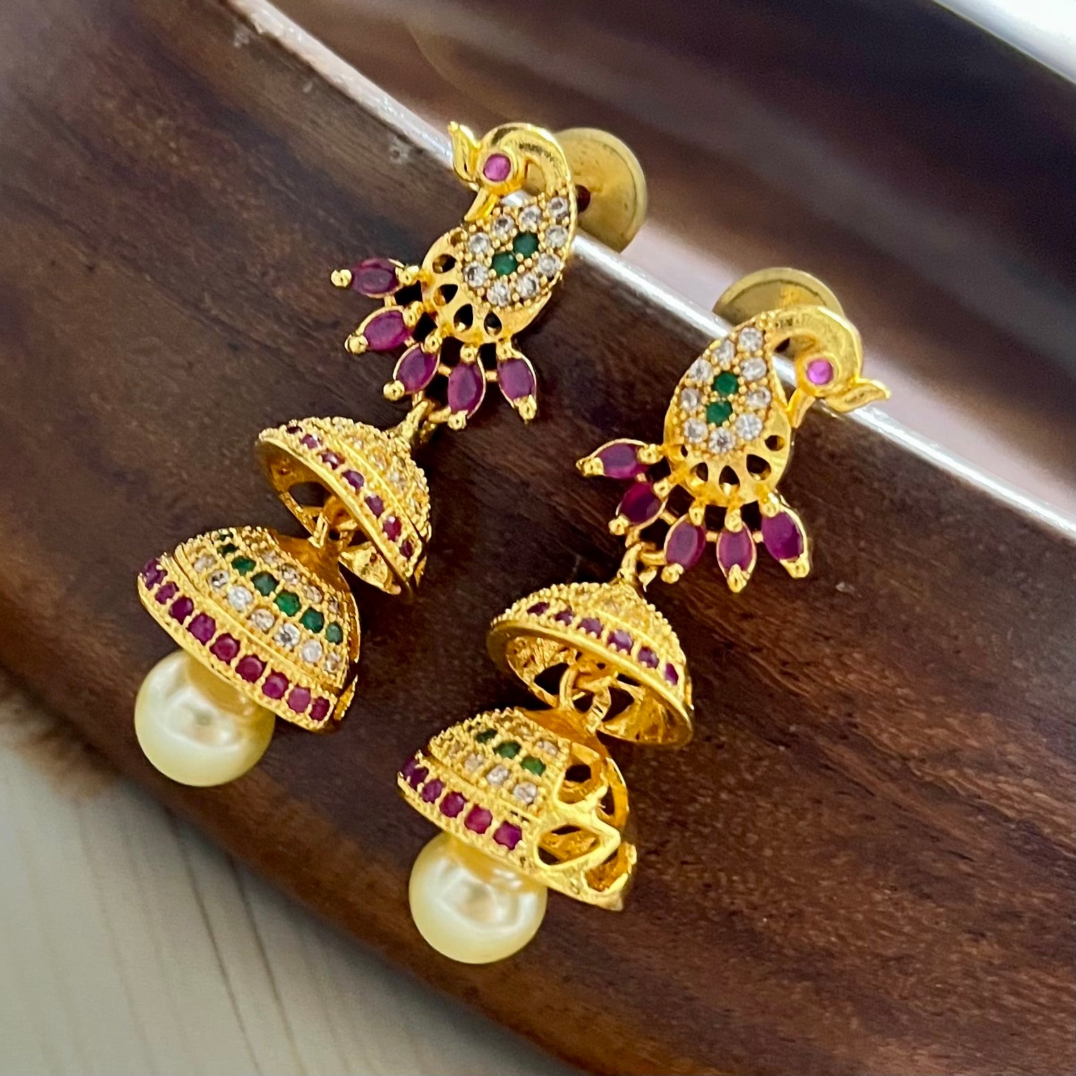 peacock jhumkas, traditional earrings, gold plated jhumkas, ethnic jewellery, indian earrings, festive earrings, party wear jhumkas, kundan earrings, bridal jewellery, designer jhumkas, temple jewellery, jhumka earrings, double layer jhumkas, colorful jhumkas, statement earrings, south indian jewellery, wedding earrings, handmade earrings, boutique earrings, Matsya Boutique