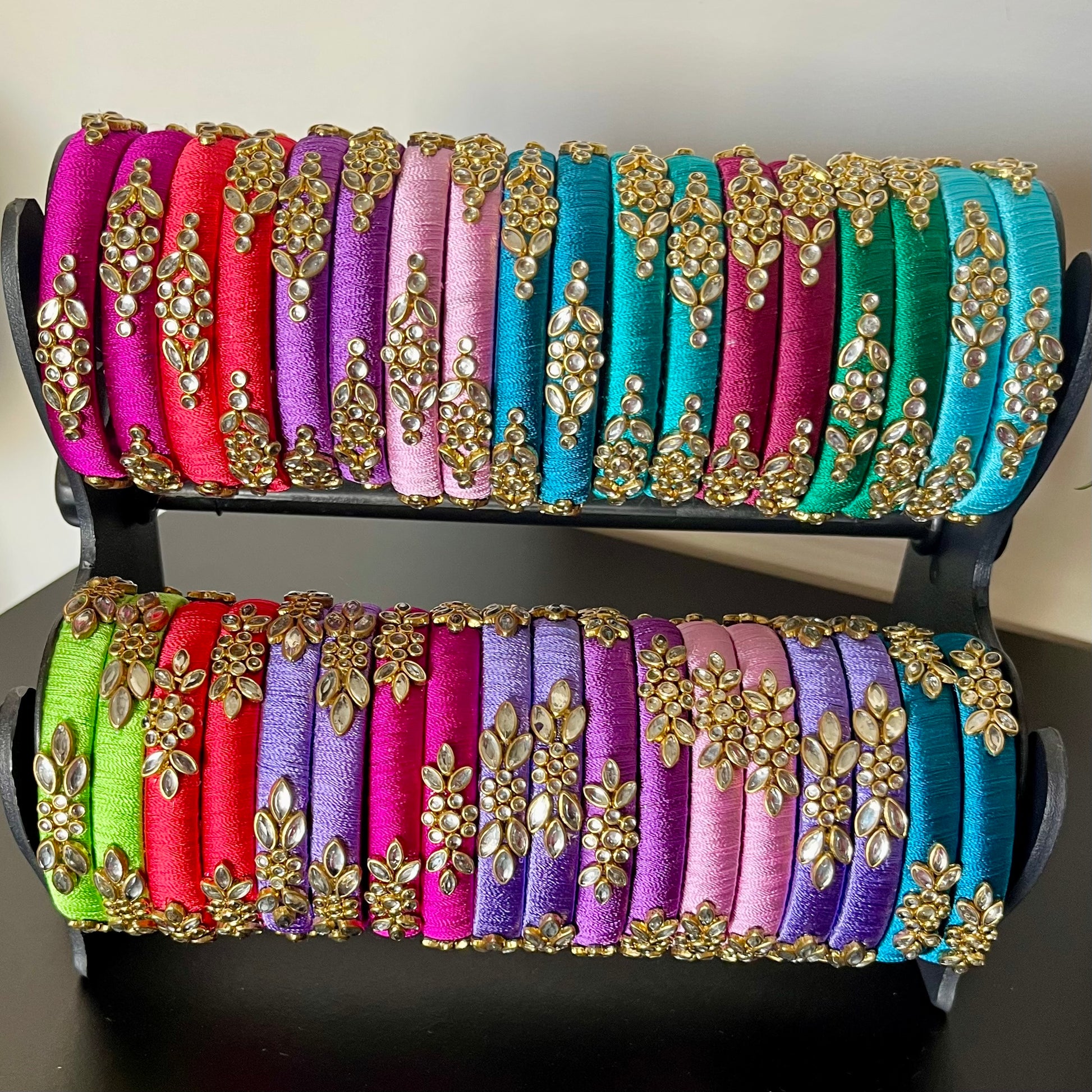 multicolor silk thread bangles, kundan bangles for return gift, traditional silk thread bangles, handmade bangles for women, ethnic bangle set for gifting, return gift bangles online, festive bangles for ladies, wedding return gift ideas, colorful kundan bangles set, pooja return gift bangles, Indian function return gifts, silk thread kundan bangles combo, women’s ethnic wear accessories, handmade return gifts for guests, bridal bangle gift set