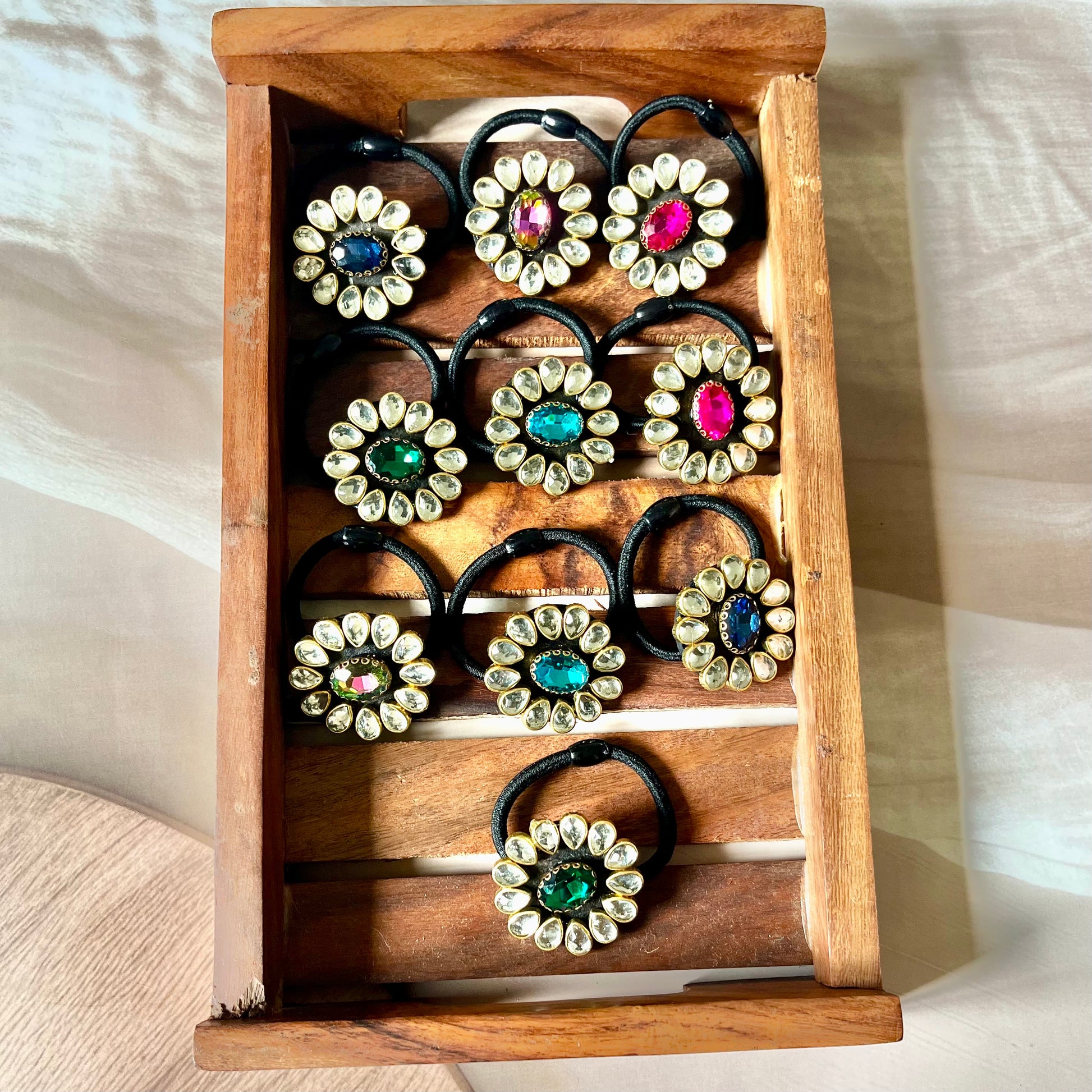 kundan hairbands, embellished hair ties, Indian hair accessories, festive hairbands, traditional hairbands, bridal hair accessories, gemstone hairbands, ethnic hair ties, handmade hairbands, kundan elastic bands, stylish hair accessories, desi hairbands, hairbands for lehenga, hairbands for saree, Indian wedding accessories, kundan jewelry inspired, glam hairbands, ethnic style hairbands, jewel tone hairbands, Kriti Glam Bands