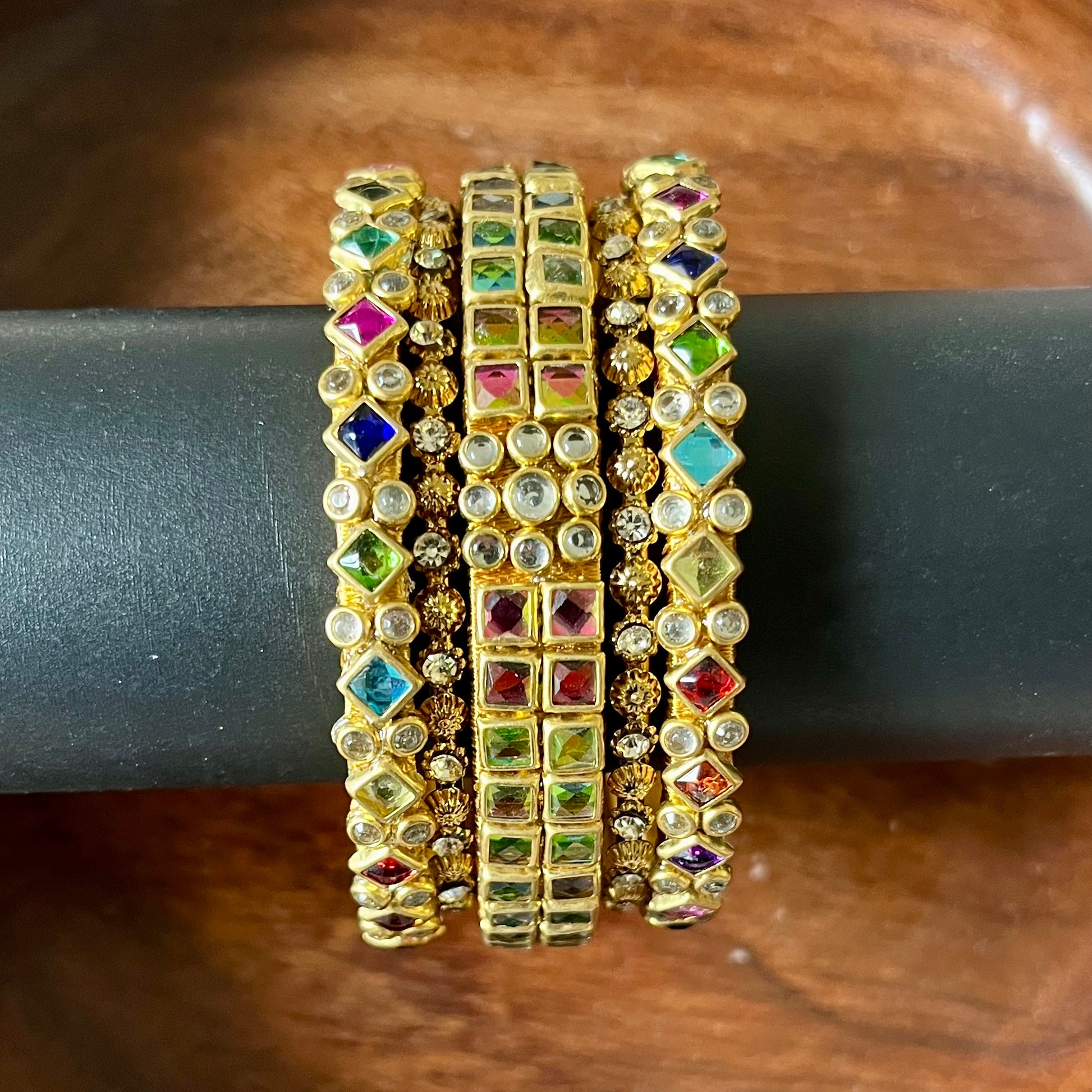 bangle stack, multicolor bangles, traditional bangles, Indian jewelry, statement jewelry, ethnic accessories, colorful bangles, bridal jewelry, festival jewelry, wedding bangles, handmade bangles, kundan bangles, designer bangles, trendy bangles, matsya boutique