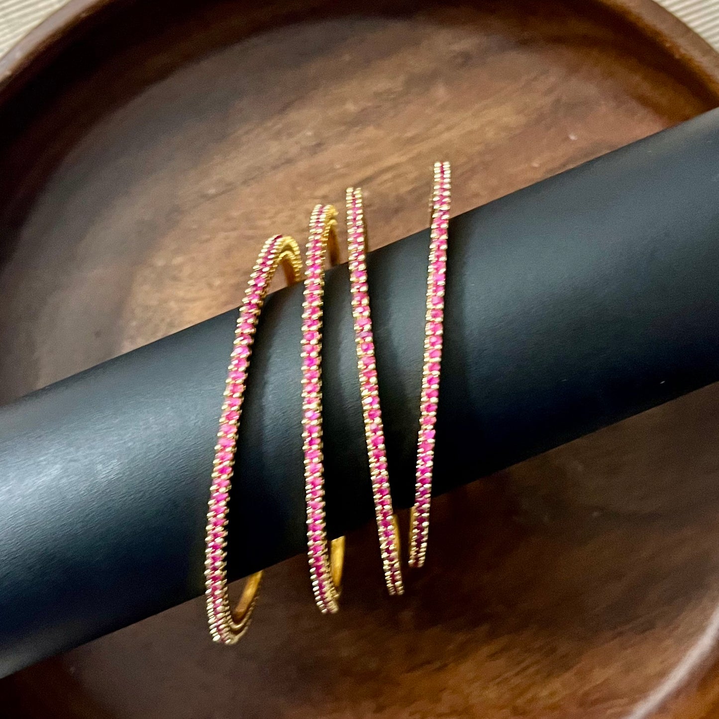 minimalist bangles, crystal bangles, pink stone bangles, gold plated bangles, dainty bangles, everyday wear bangles, party wear bangles, stackable bangles, thin bangles set, American diamond bangles, elegant bangles for women, lightweight bangles, trendy bangles, festive bangles, wedding guest jewelry, handmade bangles India, stylish bangles online, office wear bangles, fashion bangles for girls, bangle set for gifting
