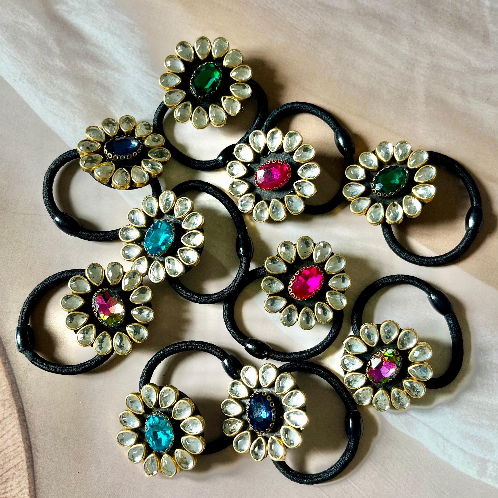kundan hairbands, embellished hair ties, Indian hair accessories, festive hairbands, traditional hairbands, bridal hair accessories, gemstone hairbands, ethnic hair ties, handmade hairbands, kundan elastic bands, stylish hair accessories, desi hairbands, hairbands for lehenga, hairbands for saree, Indian wedding accessories, kundan jewelry inspired, glam hairbands, ethnic style hairbands, jewel tone hairbands, Kriti Glam Bands