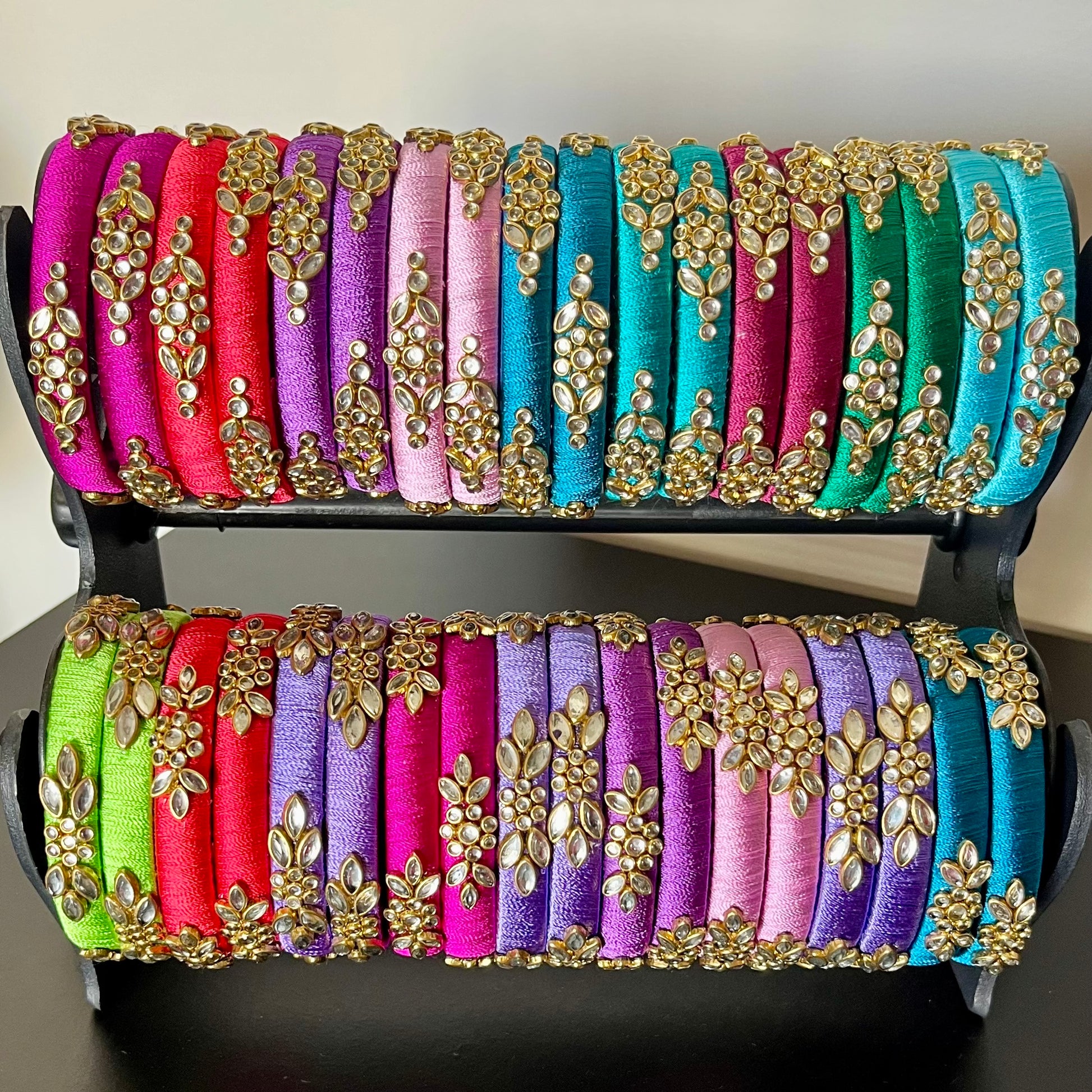 multicolor silk thread bangles, kundan bangles for return gift, traditional silk thread bangles, handmade bangles for women, ethnic bangle set for gifting, return gift bangles online, festive bangles for ladies, wedding return gift ideas, colorful kundan bangles set, pooja return gift bangles, Indian function return gifts, silk thread kundan bangles combo, women’s ethnic wear accessories, handmade return gifts for guests, bridal bangle gift set