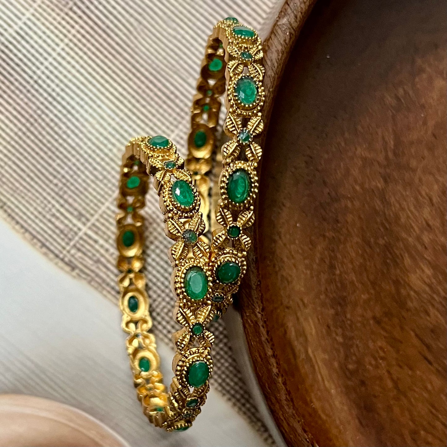 vintage gold bangles, red and green stone bangles, traditional indian bangles, antique gold bangles, temple jewelry bangles, bridal gold bangles, ruby emerald bangles, south indian bangles, kemp stone bangles, ethnic bangles for women, gold look bangles, festive wear bangles, wedding jewelry, handcrafted bangles, designer gold bangles, classic indian bangles, party wear bangles, gold plated bangles, traditional jewelry, matsya boutique bangles