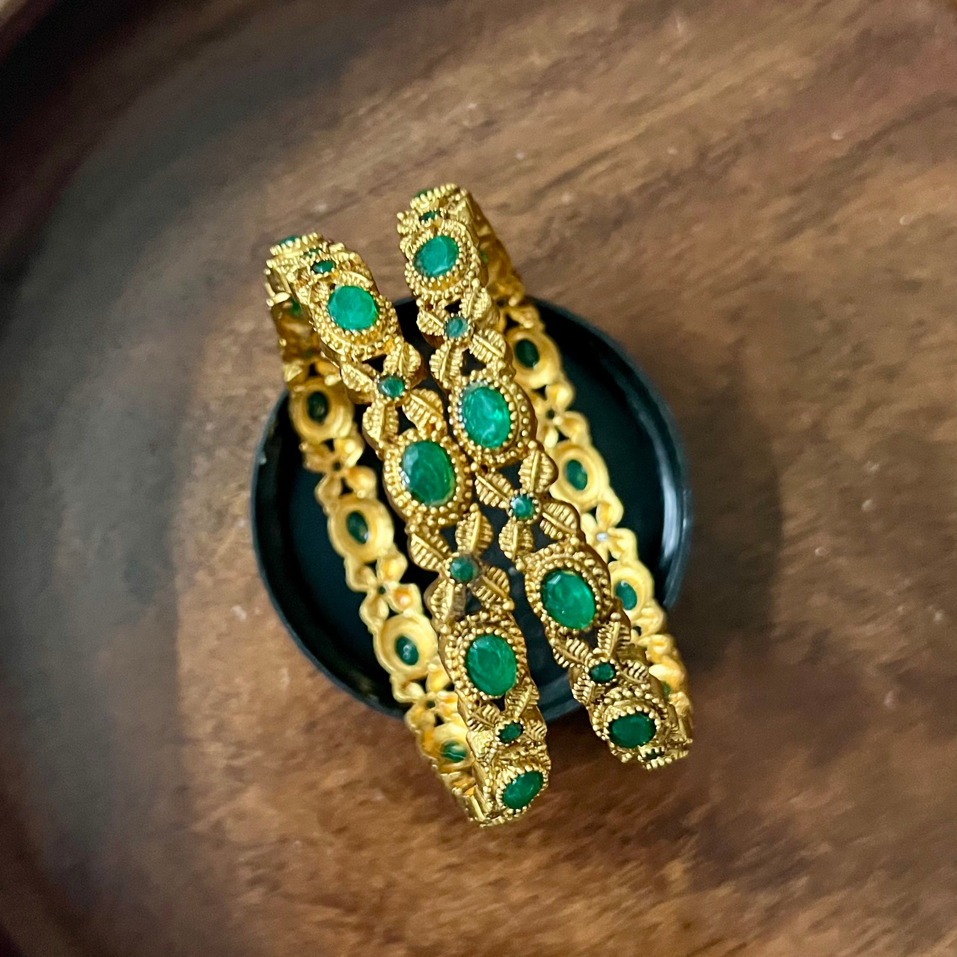 vintage gold bangles, red and green stone bangles, traditional indian bangles, antique gold bangles, temple jewelry bangles, bridal gold bangles, ruby emerald bangles, south indian bangles, kemp stone bangles, ethnic bangles for women, gold look bangles, festive wear bangles, wedding jewelry, handcrafted bangles, designer gold bangles, classic indian bangles, party wear bangles, gold plated bangles, traditional jewelry, matsya boutique bangles