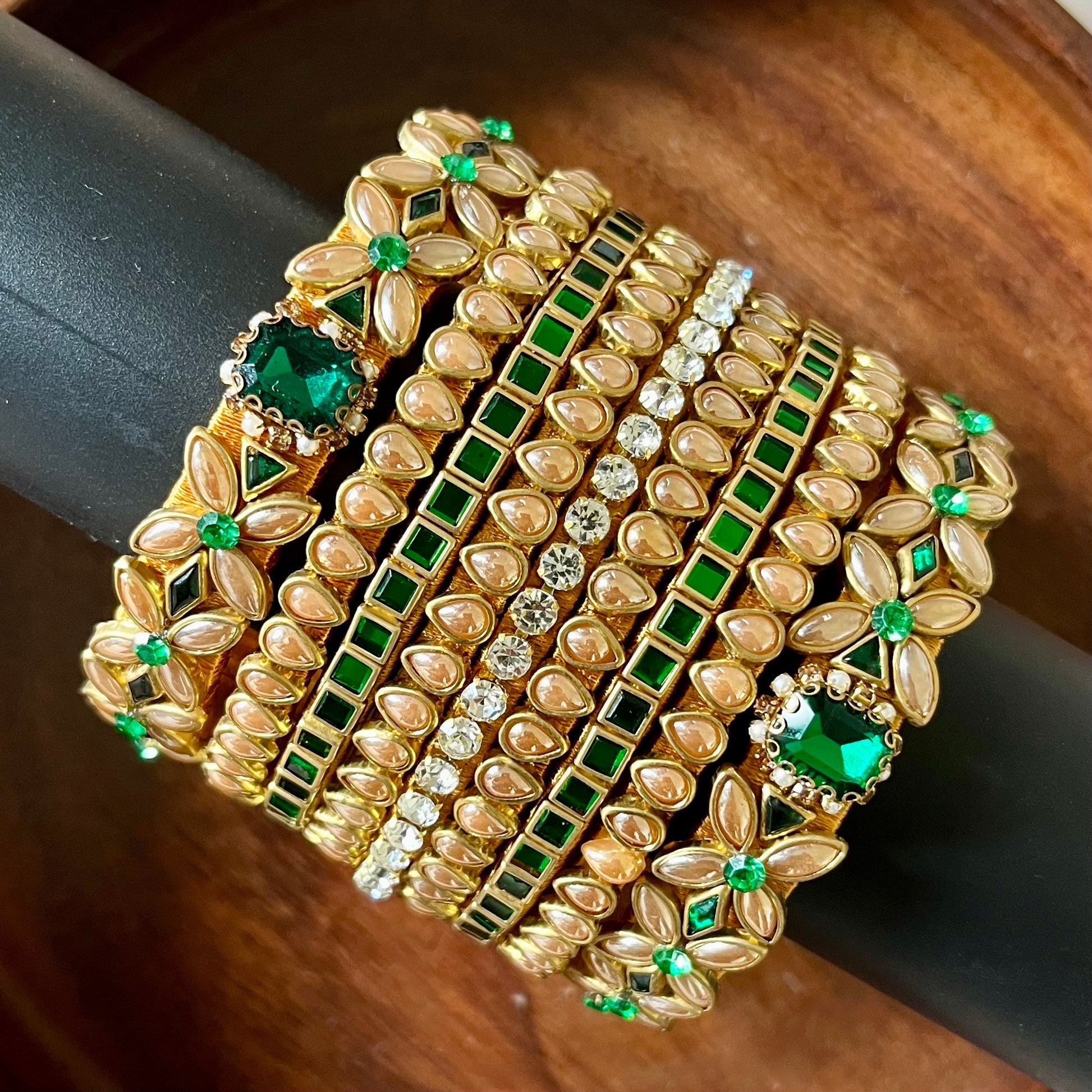 green gold bangle set, kundan bangle set, bridal bangles, traditional bangles, festive bangles, Indian bangle set, emerald bangle set, gold bangles for women, kundan jewelry, wedding bangles, designer bangle set, floral bangles, pearl bangles, handcrafted bangles, ethnic wear accessories, bangle set for saree, bangle set for lehenga, silk thread bangles, bangles for gifting, party wear bangles