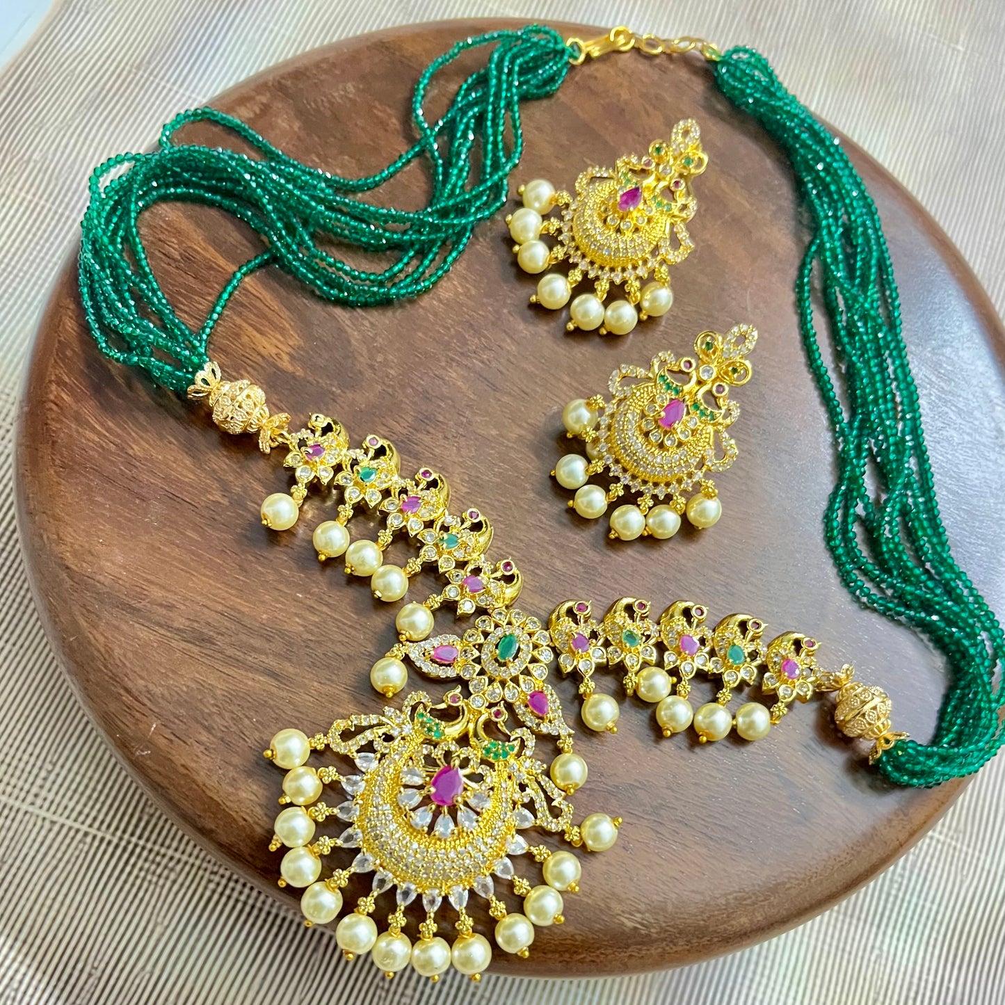 peacock jewelry set, temple jewelry, bridal necklace set, traditional Indian jewelry, antique gold necklace, pearl choker set, wedding jewelry, South Indian jewelry, handcrafted jewelry, emerald bead necklace, designer jewelry set, ethnic necklace set, statement earrings, imitation jewelry, festive jewelry