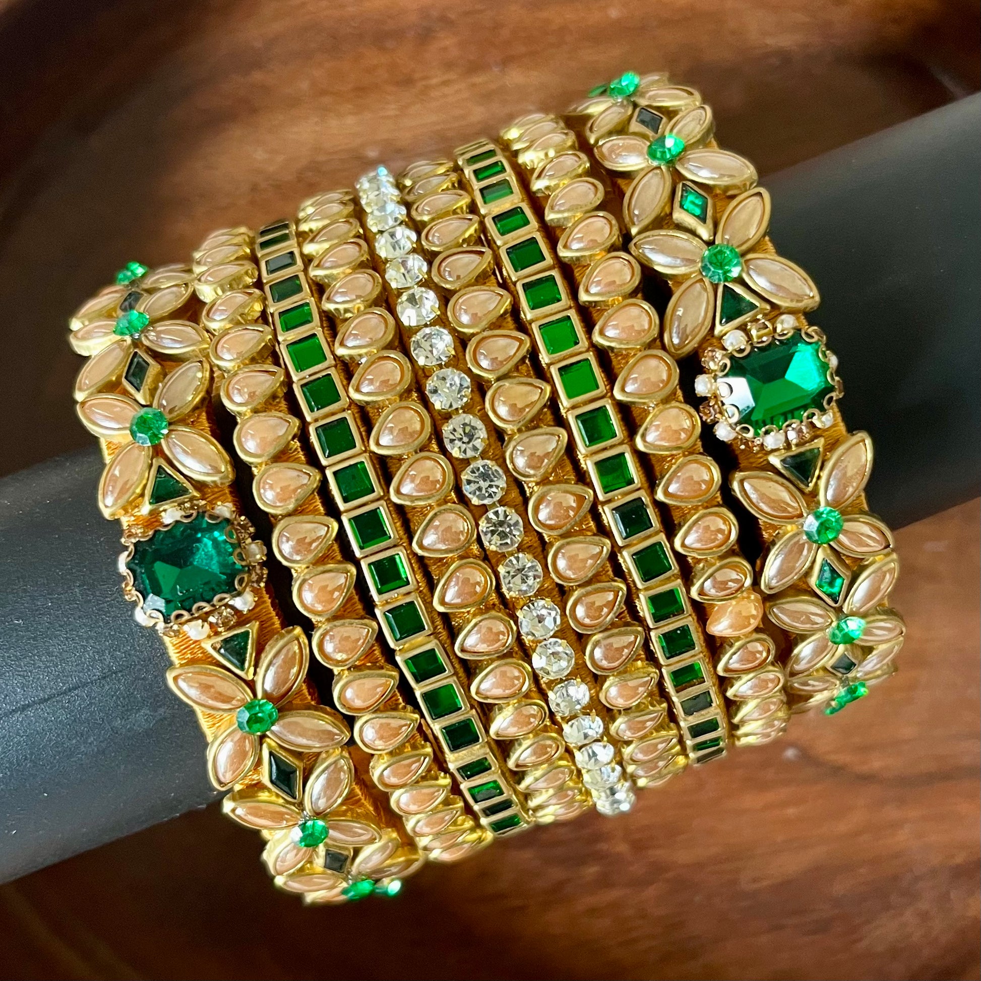 green gold bangle set, kundan bangle set, bridal bangles, traditional bangles, festive bangles, Indian bangle set, emerald bangle set, gold bangles for women, kundan jewelry, wedding bangles, designer bangle set, floral bangles, pearl bangles, handcrafted bangles, ethnic wear accessories, bangle set for saree, bangle set for lehenga, silk thread bangles, bangles for gifting, party wear bangles
