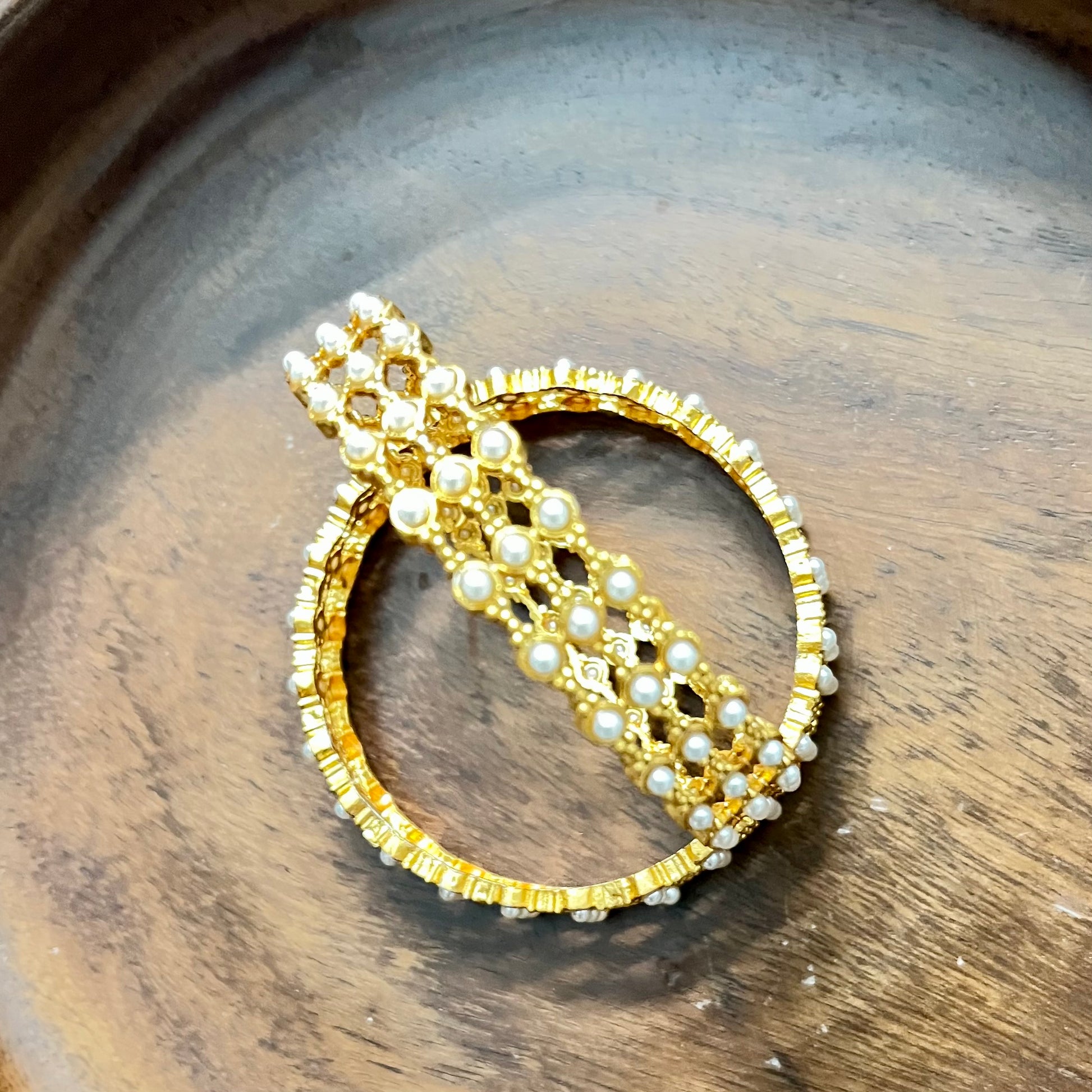 pearl mesh bangles, gold tone bangles, bridal bangles set, traditional kada bangles, pearl kada for women, ethnic bangle set, Indian wedding bangles, festive wear bangles, gold pearl kada, handcrafted bangles, royal pearl bangles, mesh design bangles, kundan style bangles, designer bangles online, party wear bangles for saree