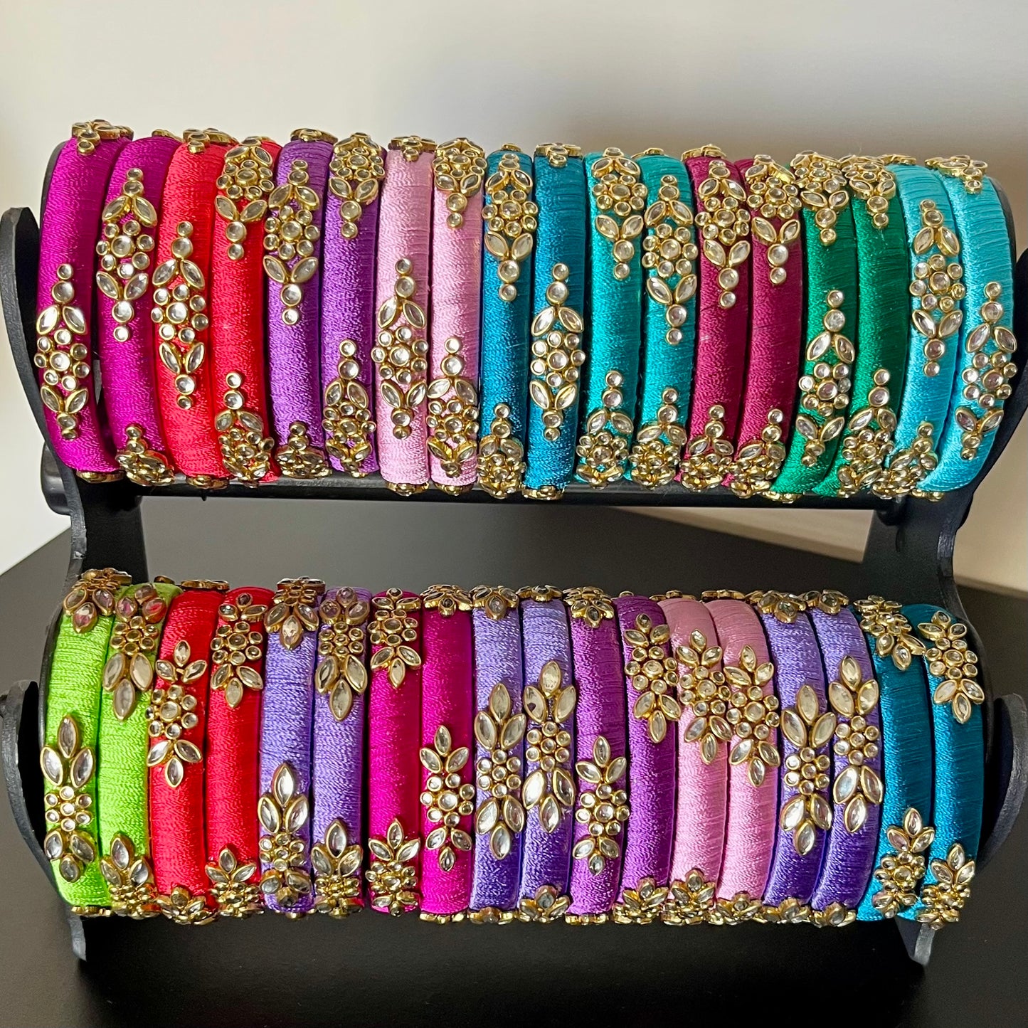 multicolor silk thread bangles, kundan bangles for return gift, traditional silk thread bangles, handmade bangles for women, ethnic bangle set for gifting, return gift bangles online, festive bangles for ladies, wedding return gift ideas, colorful kundan bangles set, pooja return gift bangles, Indian function return gifts, silk thread kundan bangles combo, women’s ethnic wear accessories, handmade return gifts for guests, bridal bangle gift set