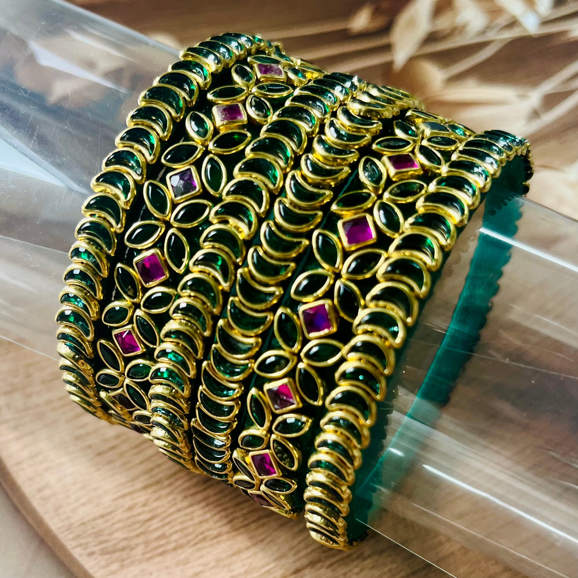 traditional bangles, kundan bangles, green bangles, ruby bangles, bridal bangles, Indian jewelry, handmade bangles, ethnic bangles, festive wear bangles, silk thread bangles, gold tone bangles, designer bangles, wedding bangles, South Indian bangles, bangle set for women