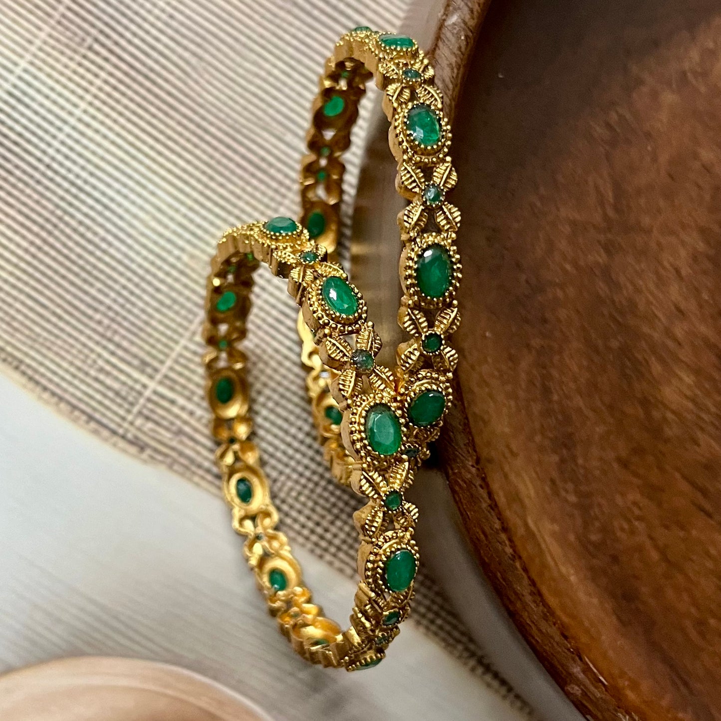 vintage gold bangles, red and green stone bangles, traditional indian bangles, antique gold bangles, temple jewelry bangles, bridal gold bangles, ruby emerald bangles, south indian bangles, kemp stone bangles, ethnic bangles for women, gold look bangles, festive wear bangles, wedding jewelry, handcrafted bangles, designer gold bangles, classic indian bangles, party wear bangles, gold plated bangles, traditional jewelry, matsya boutique bangles