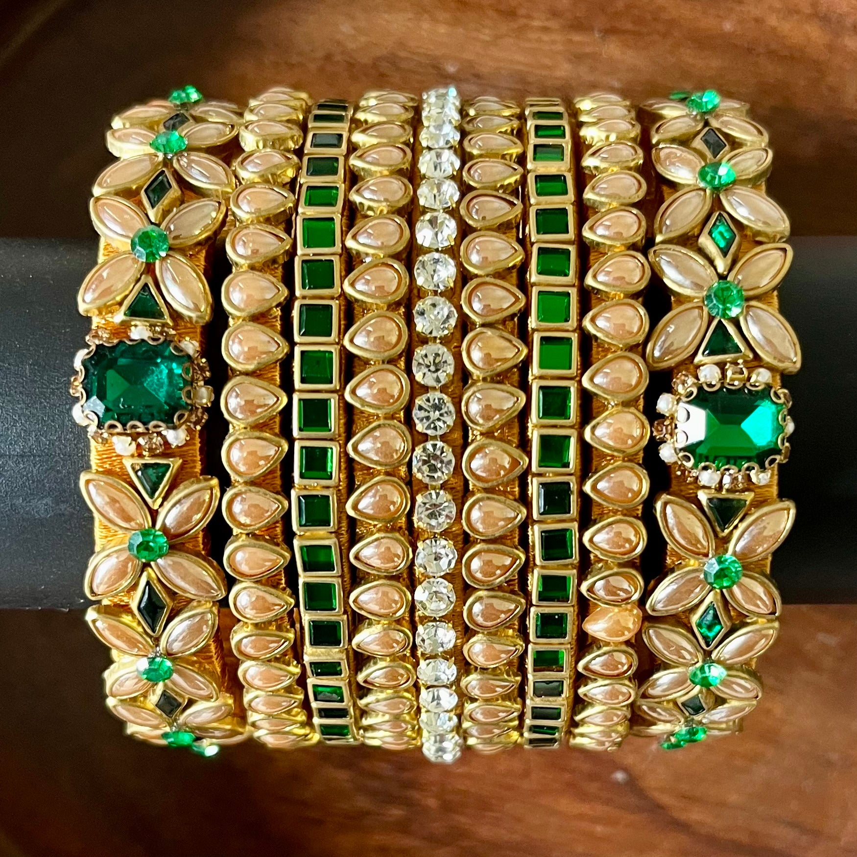 green gold bangle set, kundan bangle set, bridal bangles, traditional bangles, festive bangles, Indian bangle set, emerald bangle set, gold bangles for women, kundan jewelry, wedding bangles, designer bangle set, floral bangles, pearl bangles, handcrafted bangles, ethnic wear accessories, bangle set for saree, bangle set for lehenga, silk thread bangles, bangles for gifting, party wear bangles