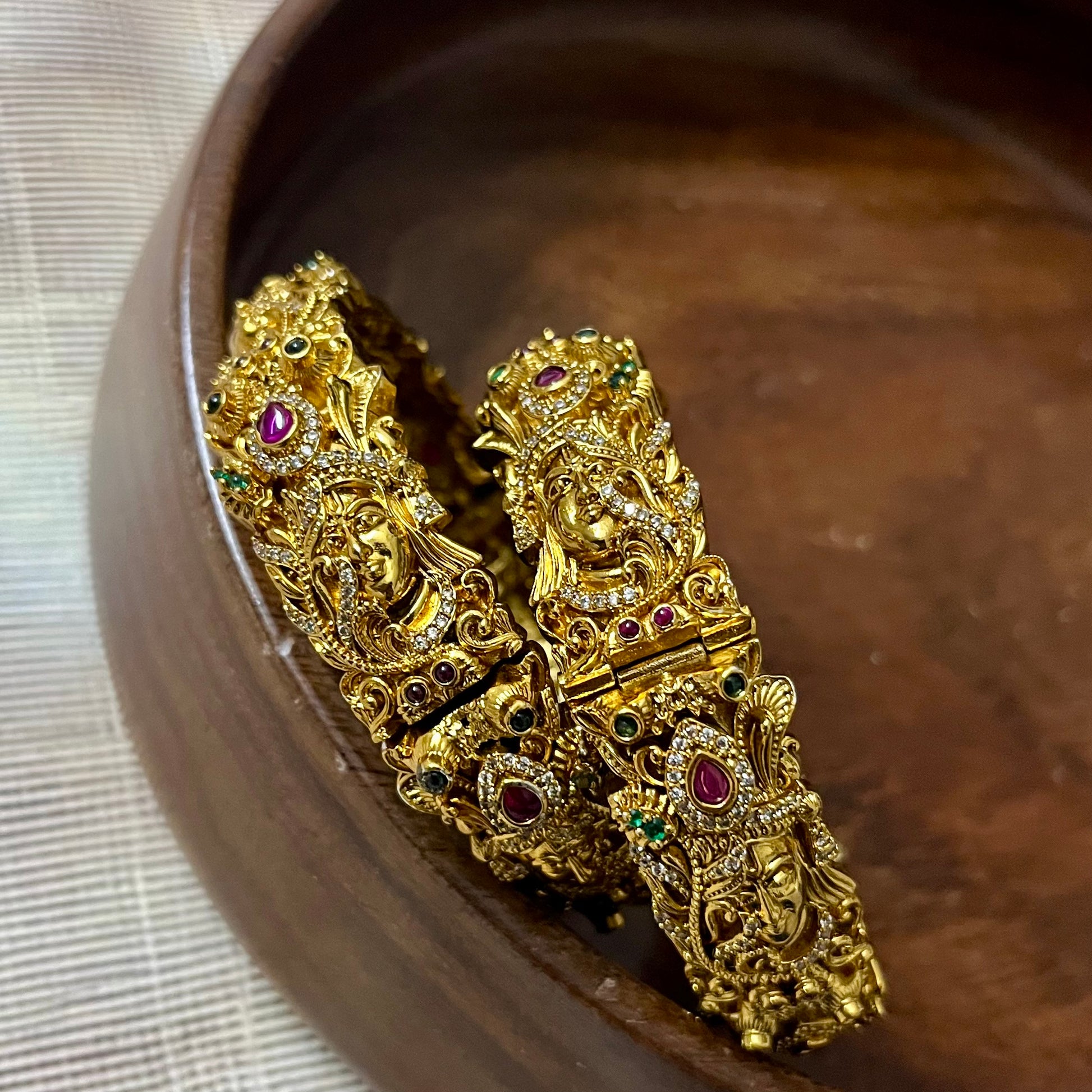 Sri Krishna bangles, Mayura bangles, Krishna peacock bangles, Antique gold bangles, Temple jewelry bangles, Handcrafted kada bangles, Ruby emerald bangles, Traditional Indian bridal jewelry, Spiritual jewelry for weddings, Festive occasion bangles, Indian ethnic bangles, Lord Krishna jewelry, Temple style bangles, Peacock motif jewelry, Hand-set stones bangles, Bridal bangles online India