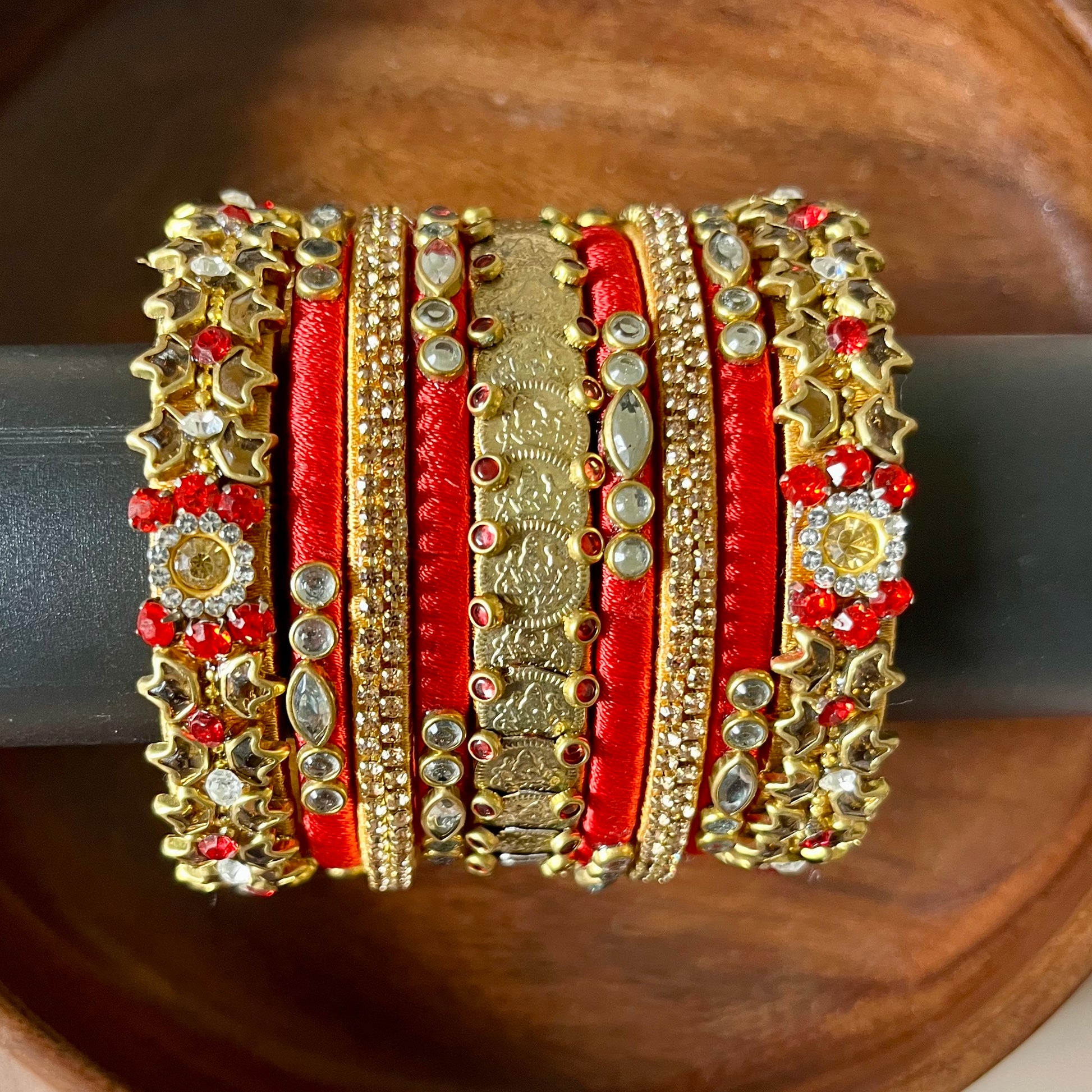 red and gold bangles, bridal bangle set, silk thread bangles, kundan bangles, handmade bangles, traditional bangle set, wedding bangles, Indian bridal jewelry, ethnic bangles, red bangle set, gold bangle set, 9 piece bangle set, festive bangles, designer bangles, Chandrika Charm bangles