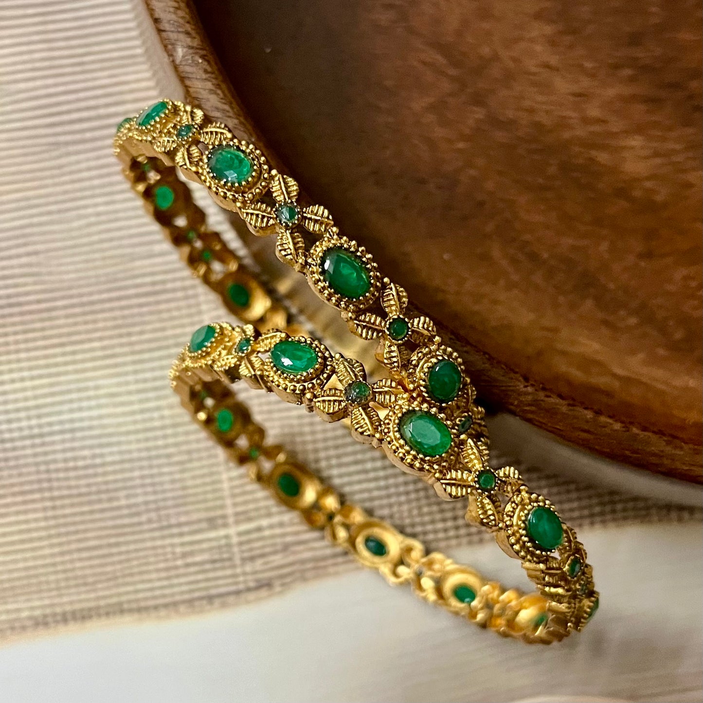 vintage gold bangles, red and green stone bangles, traditional indian bangles, antique gold bangles, temple jewelry bangles, bridal gold bangles, ruby emerald bangles, south indian bangles, kemp stone bangles, ethnic bangles for women, gold look bangles, festive wear bangles, wedding jewelry, handcrafted bangles, designer gold bangles, classic indian bangles, party wear bangles, gold plated bangles, traditional jewelry, matsya boutique bangles