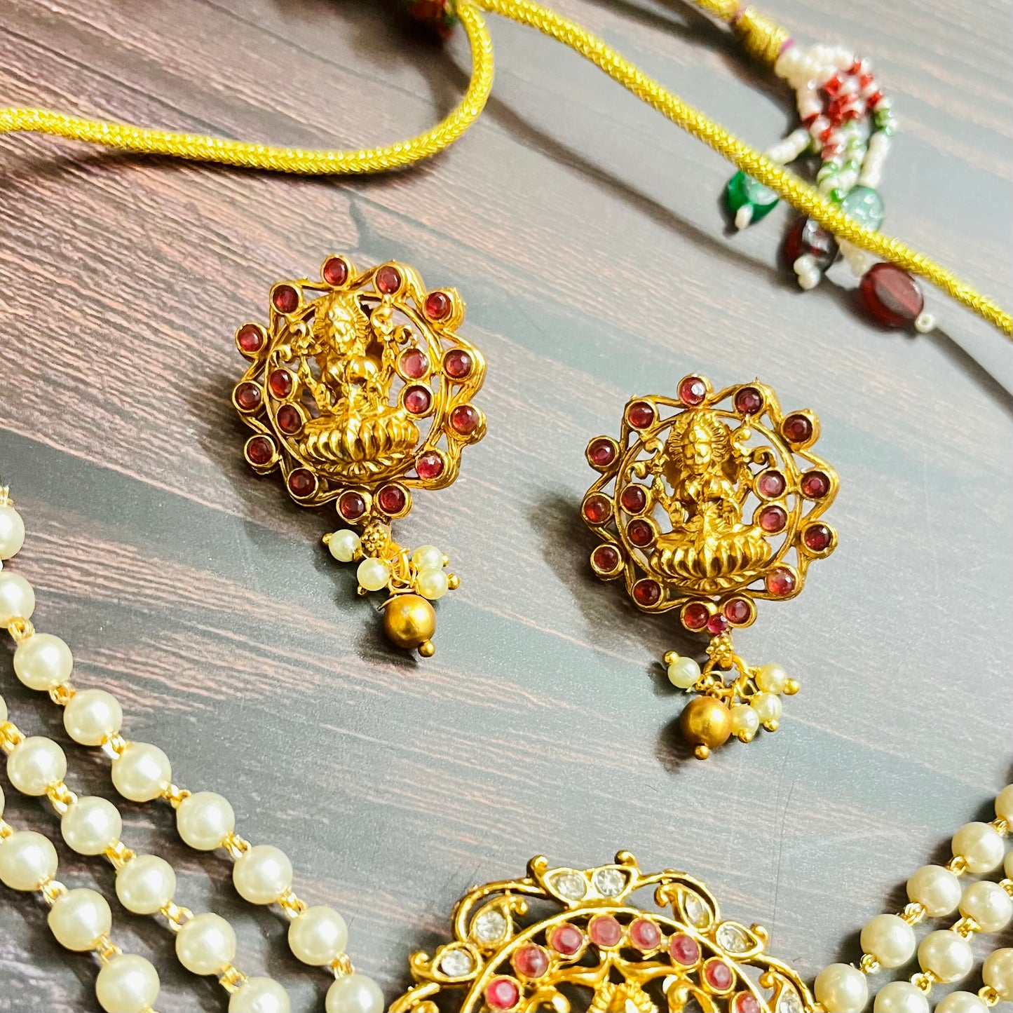 lakshmi choker, temple jewelry, pearl choker, traditional jewelry, Indian jewelry, south Indian style, bridal choker set, handcrafted jewelry, gold plated, festive wear, ethnic accessories, wedding jewelry, goddess jewelry, kundan stones, handmade necklace, antique finish, cultural jewelry, jewelry set with earrings, pooja jewelry, divine design, Indian bride, pearl necklace set, goddess lakshmi, matsya boutique, statement choker