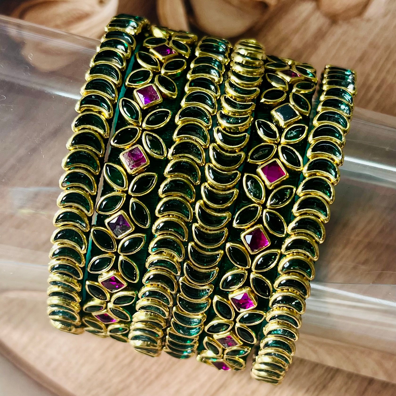traditional bangles, kundan bangles, green bangles, ruby bangles, bridal bangles, Indian jewelry, handmade bangles, ethnic bangles, festive wear bangles, silk thread bangles, gold tone bangles, designer bangles, wedding bangles, South Indian bangles, bangle set for women