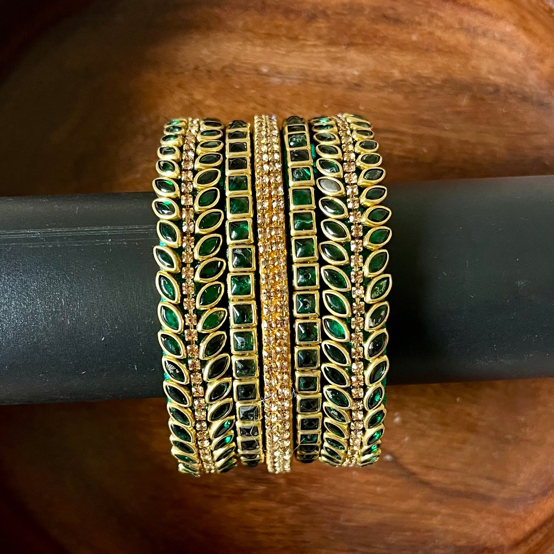 green bangles, gold bangles, bangle set, traditional bangles, Indian bangles, festive jewelry, bridal bangles, emerald bangles, ethnic jewelry, designer bangles, wedding accessories, party wear bangles, handmade bangles, stone bangles, jewelry for saree