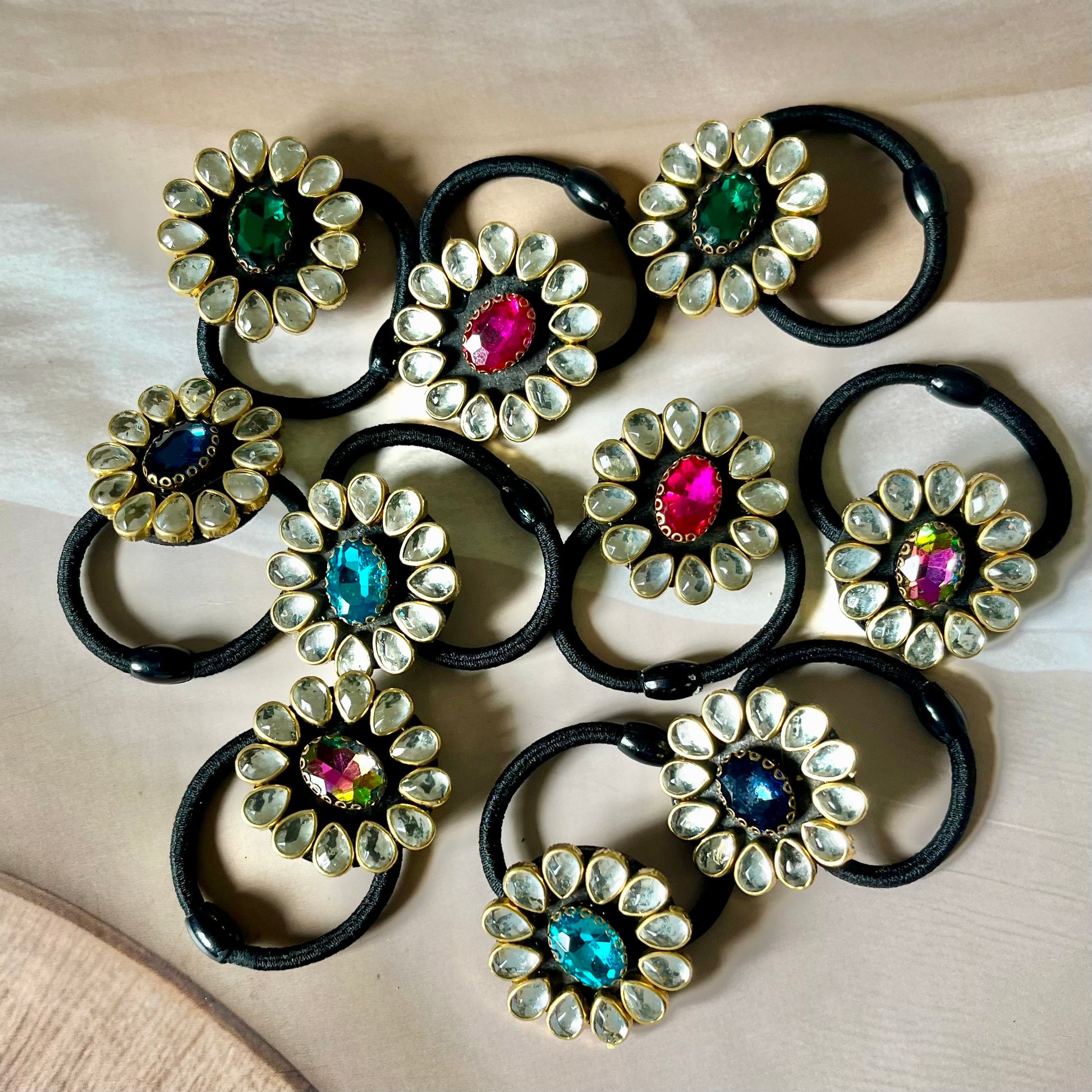 kundan hairbands, embellished hair ties, Indian hair accessories, festive hairbands, traditional hairbands, bridal hair accessories, gemstone hairbands, ethnic hair ties, handmade hairbands, kundan elastic bands, stylish hair accessories, desi hairbands, hairbands for lehenga, hairbands for saree, Indian wedding accessories, kundan jewelry inspired, glam hairbands, ethnic style hairbands, jewel tone hairbands, Kriti Glam Bands