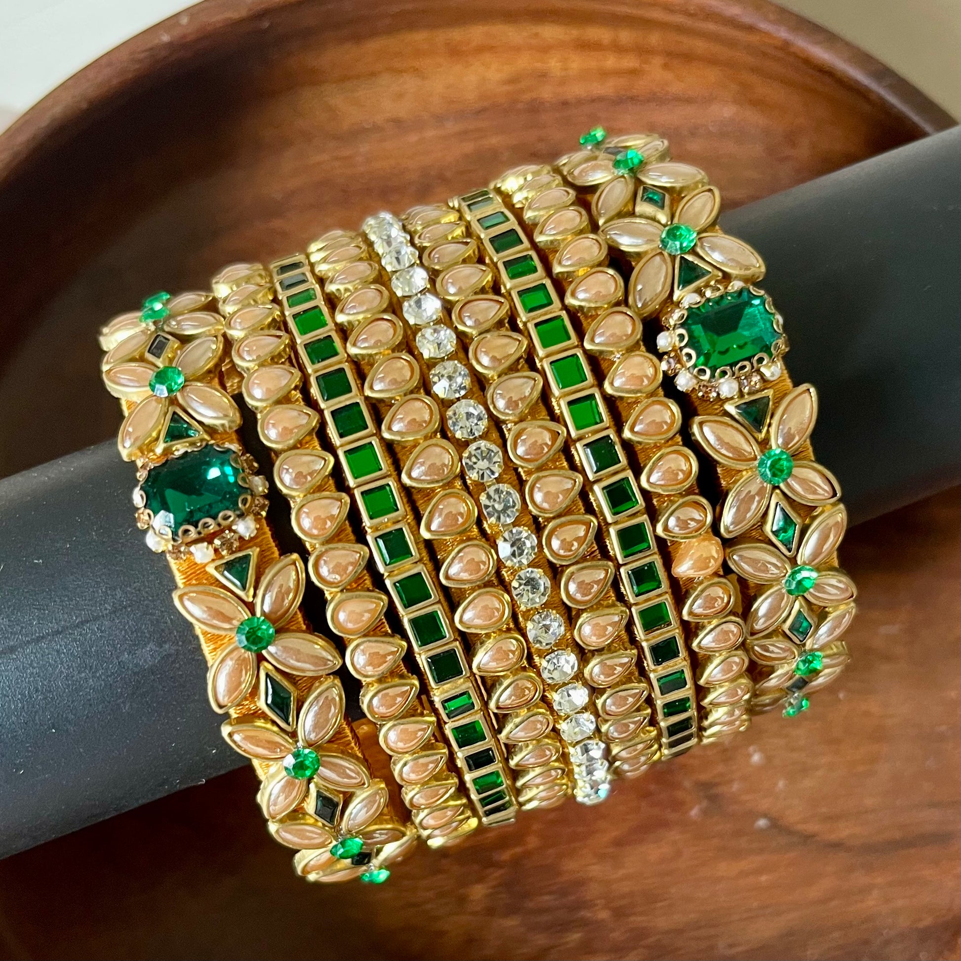 green gold bangle set, kundan bangle set, bridal bangles, traditional bangles, festive bangles, Indian bangle set, emerald bangle set, gold bangles for women, kundan jewelry, wedding bangles, designer bangle set, floral bangles, pearl bangles, handcrafted bangles, ethnic wear accessories, bangle set for saree, bangle set for lehenga, silk thread bangles, bangles for gifting, party wear bangles