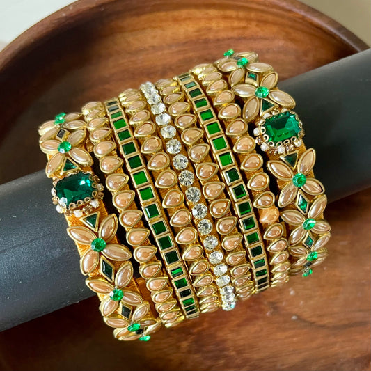 green gold bangle set, kundan bangle set, bridal bangles, traditional bangles, festive bangles, Indian bangle set, emerald bangle set, gold bangles for women, kundan jewelry, wedding bangles, designer bangle set, floral bangles, pearl bangles, handcrafted bangles, ethnic wear accessories, bangle set for saree, bangle set for lehenga, silk thread bangles, bangles for gifting, party wear bangles