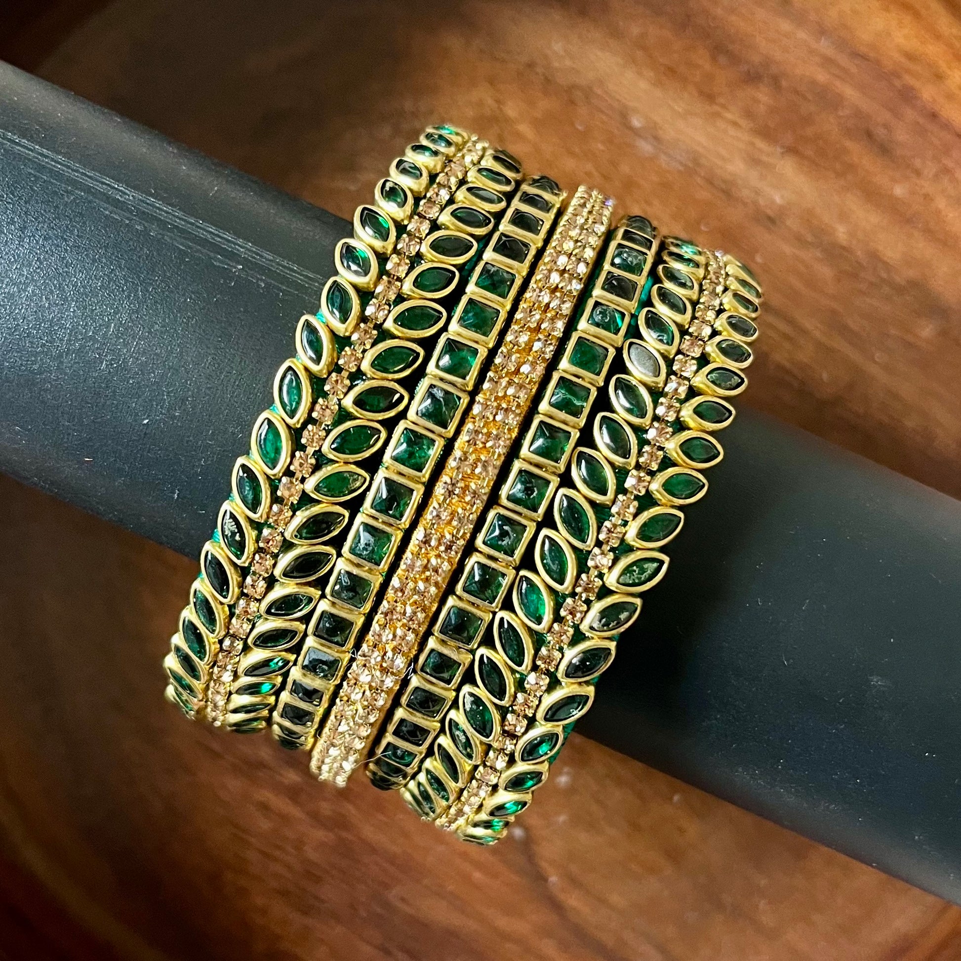 green bangles, gold bangles, bangle set, traditional bangles, Indian bangles, festive jewelry, bridal bangles, emerald bangles, ethnic jewelry, designer bangles, wedding accessories, party wear bangles, handmade bangles, stone bangles, jewelry for saree