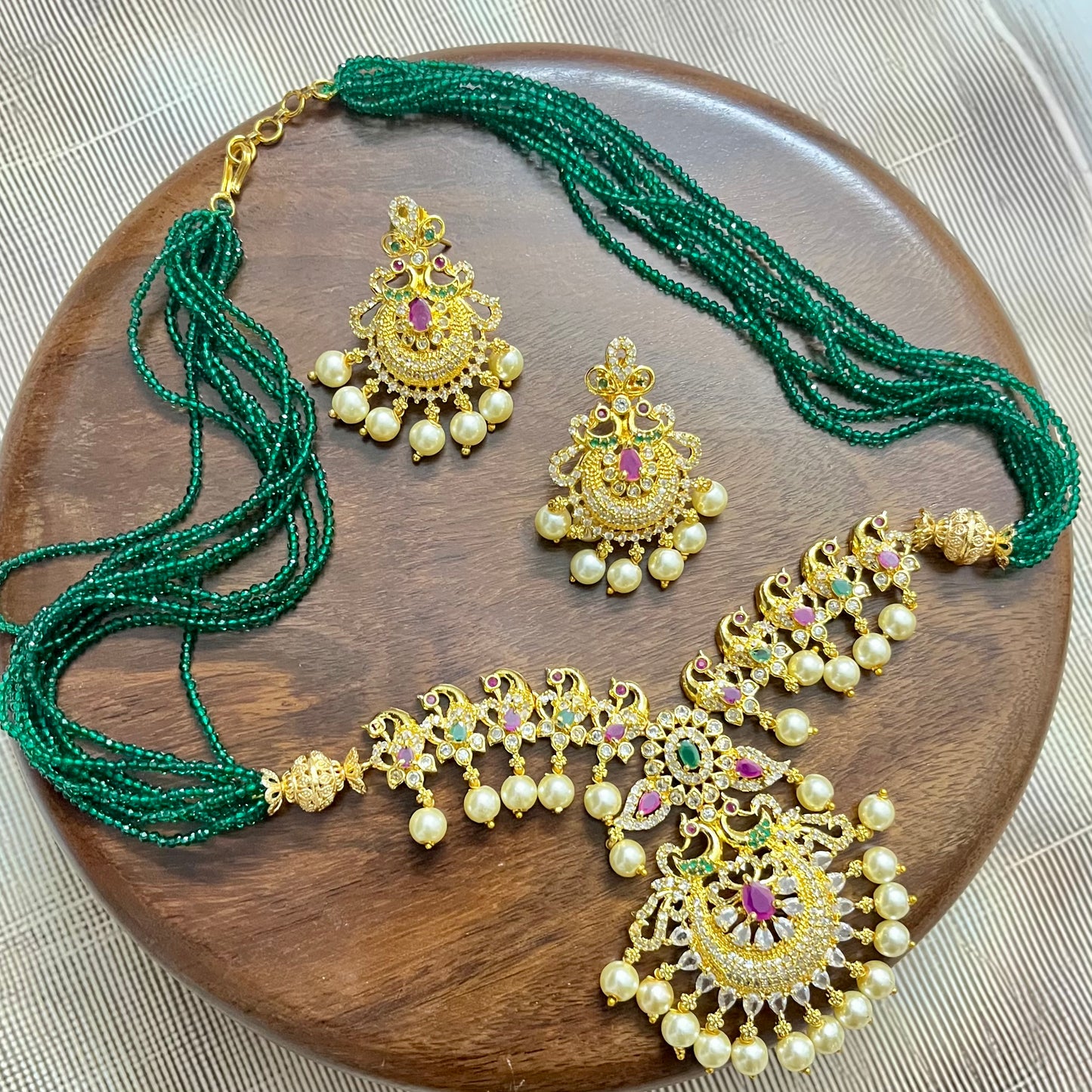 peacock jewelry set, temple jewelry, bridal necklace set, traditional Indian jewelry, antique gold necklace, pearl choker set, wedding jewelry, South Indian jewelry, handcrafted jewelry, emerald bead necklace, designer jewelry set, ethnic necklace set, statement earrings, imitation jewelry, festive jewelry