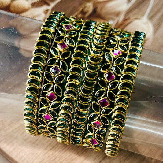 traditional bangles, kundan bangles, green bangles, ruby bangles, bridal bangles, Indian jewelry, handmade bangles, ethnic bangles, festive wear bangles, silk thread bangles, gold tone bangles, designer bangles, wedding bangles, South Indian bangles, bangle set for women