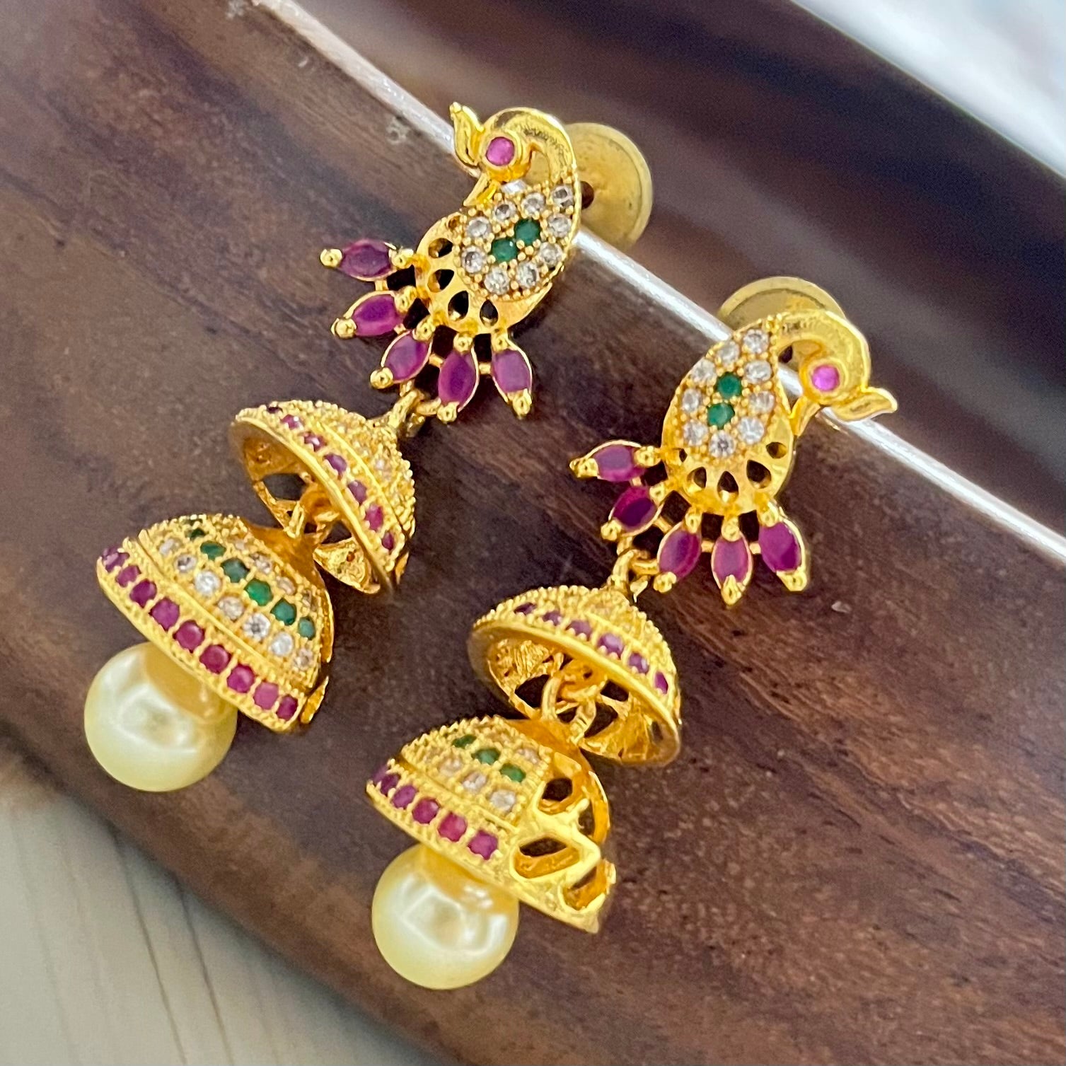 peacock jhumkas, traditional earrings, gold plated jhumkas, ethnic jewellery, indian earrings, festive earrings, party wear jhumkas, kundan earrings, bridal jewellery, designer jhumkas, temple jewellery, jhumka earrings, double layer jhumkas, colorful jhumkas, statement earrings, south indian jewellery, wedding earrings, handmade earrings, boutique earrings, Matsya Boutique