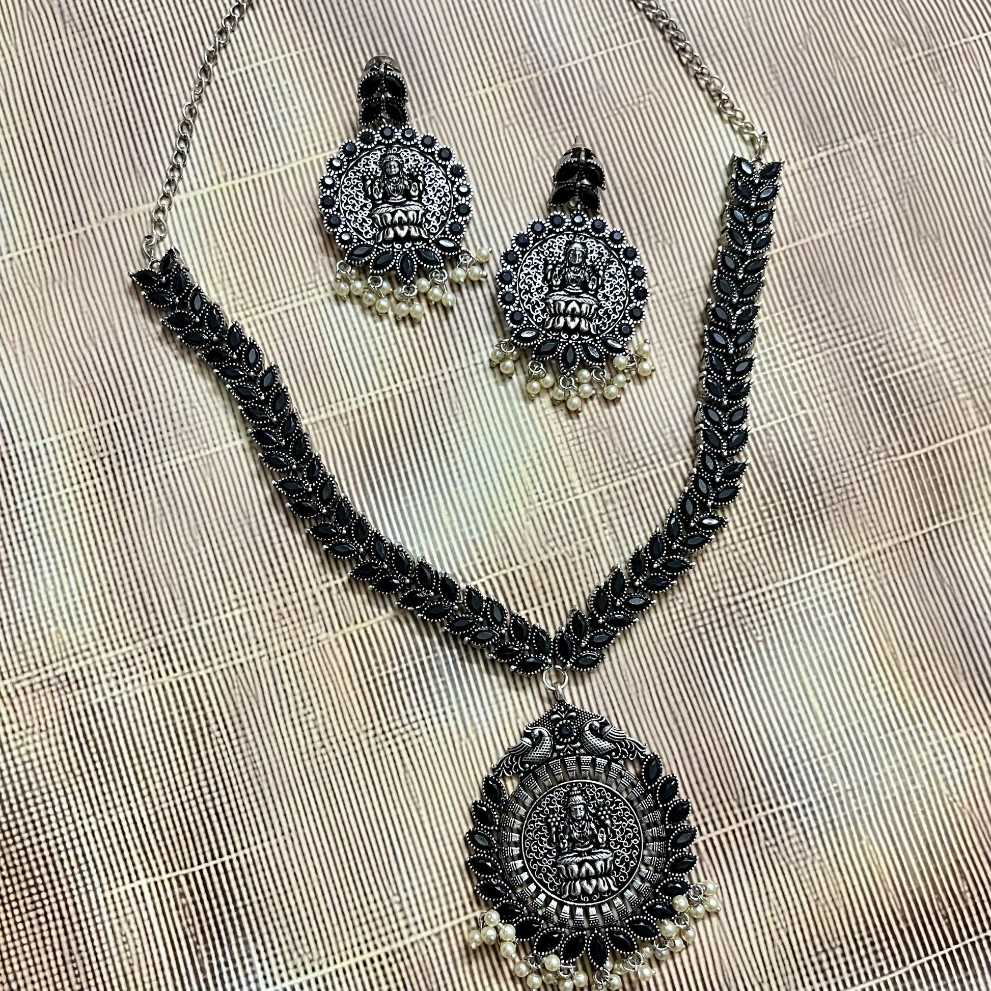 Oxidized Jewelry, Temple Jewelry Set, Lakshmi Necklace Set, Traditional Necklace, Indian Ethnic Jewelry, Antique Silver Jewelry, Festival Jewelry, Goddess Pendant Set, Handcrafted Jewelry, Pearl Drop Necklace, Oxidized Necklace for Women, South Indian Jewelry, Ethnic Wear Accessories, Oxidized Earrings Set, Bridal Temple Jewelry, Statement Necklace Set, Jewelry for Saree, Handmade Oxidized Jewelry, Indian Festive Jewelry, Boho Ethnic Jewelry