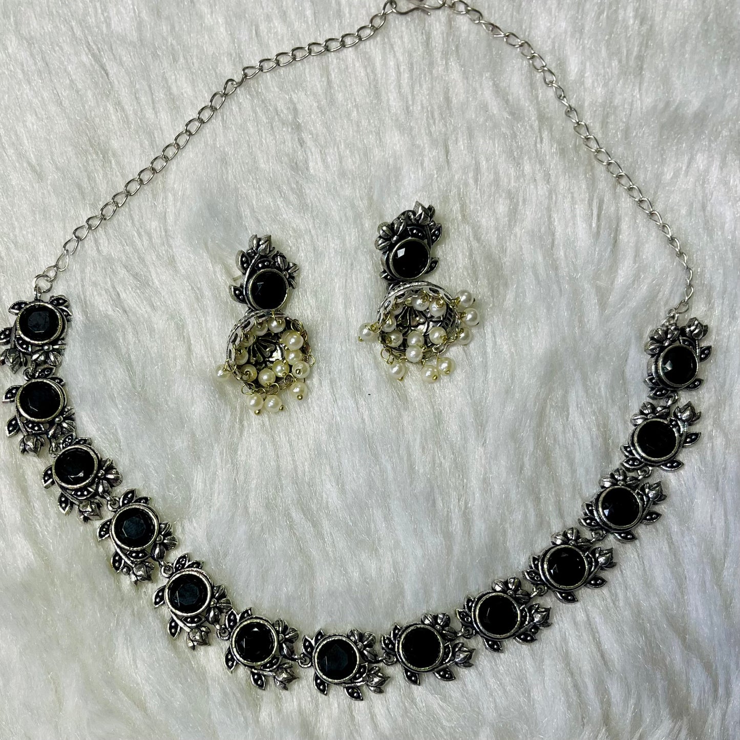 oxidized jewelry set, black stone necklace, floral oxidized choker, tribal necklace for women, antique finish jewelry, handmade oxidized necklace, ethnic black choker, silver oxidized set, pearl drop earrings, women’s statement jewelry, traditional Indian necklace, oxidized metal jewelry, handcrafted jewelry India, desi accessories, black floral necklace set