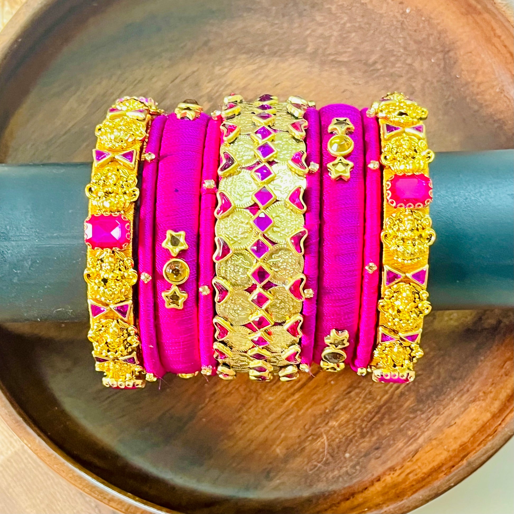 Handmade silk thread bangles, Pink and gold bangle set, Traditional Indian bangles, Designer bangle combo, Ethnic jewelry set, Wedding bangle set, Party wear bangles, Kundan style bangles, Bridal bangles India, Custom bangles Bangalore, Gold plated bangles, Silk thread jewelry, Festive bangles combo, Indian accessories, Ethnic fashion jewelry, Boutique bangles online, Handmade Indian jewelry, Traditional accessories India, Stylish bangles for women, Gold and pink bangles, Vibrant Indian bangles, Bangle stac