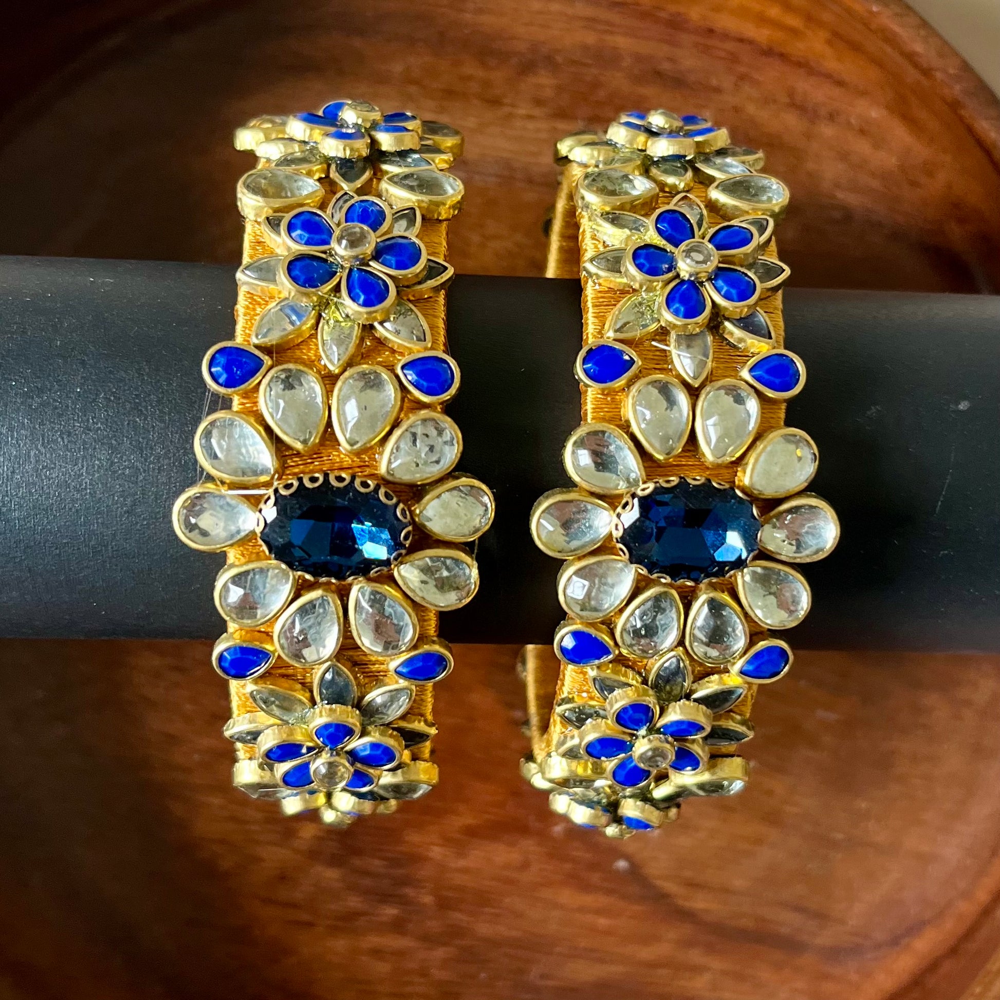 silk thread bangles, kundan bangles, handmade bangles, bridal bangles, ethnic jewelry, traditional bangles, Indian bangles, royal kada, blue kundan bangles, wedding jewelry, festive bangles, handcrafted jewelry, silk thread jewelry, statement bangles, designer bangles, kundan kada, jewelry for saree, jewelry for lehenga, party wear bangles, boutique bangles