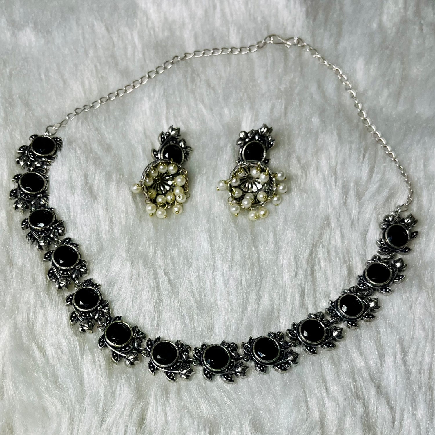 oxidized jewelry set, black stone necklace, floral oxidized choker, tribal necklace for women, antique finish jewelry, handmade oxidized necklace, ethnic black choker, silver oxidized set, pearl drop earrings, women’s statement jewelry, traditional Indian necklace, oxidized metal jewelry, handcrafted jewelry India, desi accessories, black floral necklace set