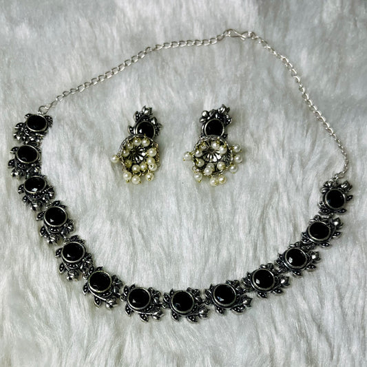 oxidized jewelry set, black stone necklace, floral oxidized choker, tribal necklace for women, antique finish jewelry, handmade oxidized necklace, ethnic black choker, silver oxidized set, pearl drop earrings, women’s statement jewelry, traditional Indian necklace, oxidized metal jewelry, handcrafted jewelry India, desi accessories, black floral necklace set