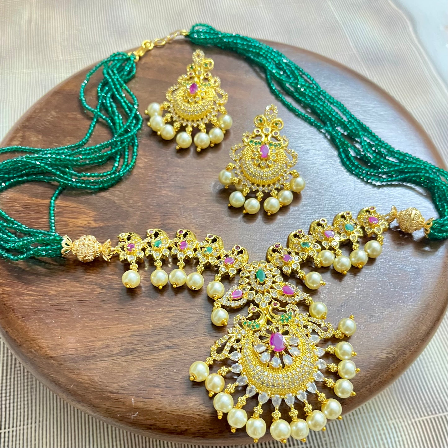 peacock jewelry set, temple jewelry, bridal necklace set, traditional Indian jewelry, antique gold necklace, pearl choker set, wedding jewelry, South Indian jewelry, handcrafted jewelry, emerald bead necklace, designer jewelry set, ethnic necklace set, statement earrings, imitation jewelry, festive jewelry