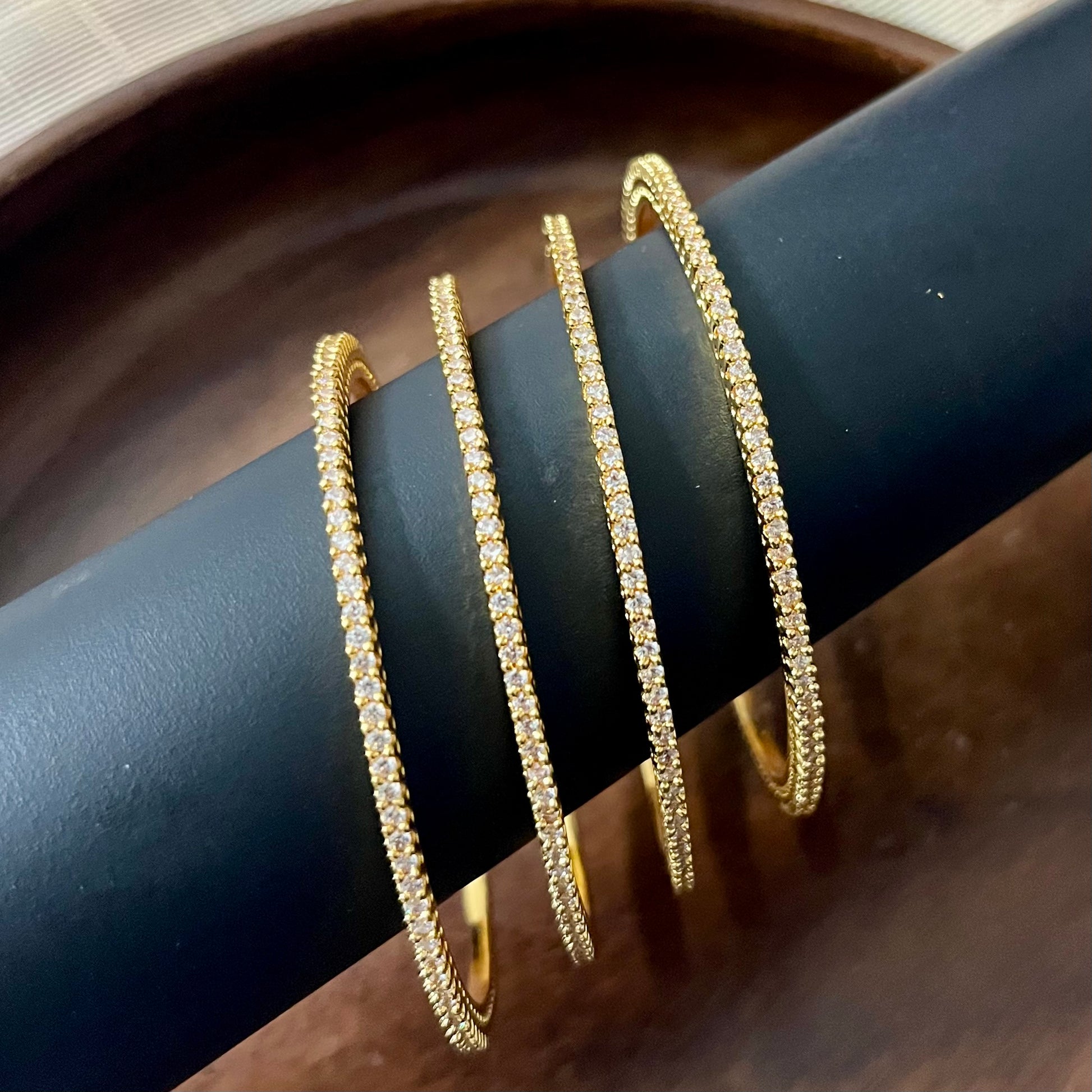 minimalist bangles, crystal bangles, pink stone bangles, gold plated bangles, dainty bangles, everyday wear bangles, party wear bangles, stackable bangles, thin bangles set, American diamond bangles, elegant bangles for women, lightweight bangles, trendy bangles, festive bangles, wedding guest jewelry, handmade bangles India, stylish bangles online, office wear bangles, fashion bangles for girls, bangle set for gifting