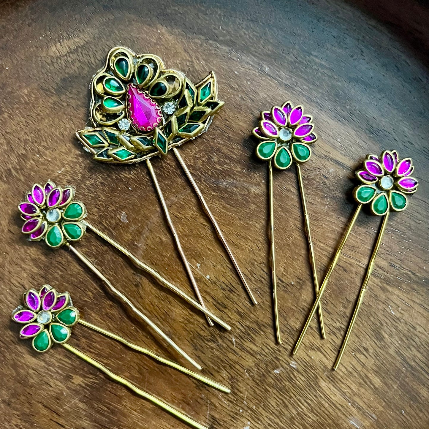 floral hair pins, kundan hair pins, traditional hair accessories, bridal hair pins, pink and green hair pins, Indian hair accessories, ethnic hair pins, festive hair accessories, wedding hair pins, bun pins for women, South Indian hair pins, kundan style pins, hair accessories for saree, handmade hair pins, designer hair accessories, gold plated hair pins, floral hair jewelry, pearl hair pins, hair pins for lehenga, Chandrika Petal Pins