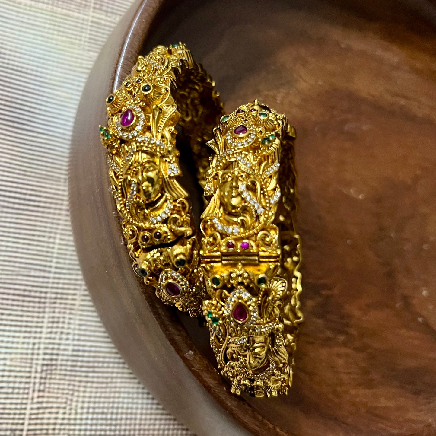 Sri Krishna bangles, Mayura bangles, Krishna peacock bangles, Antique gold bangles, Temple jewelry bangles, Handcrafted kada bangles, Ruby emerald bangles, Traditional Indian bridal jewelry, Spiritual jewelry for weddings, Festive occasion bangles, Indian ethnic bangles, Lord Krishna jewelry, Temple style bangles, Peacock motif jewelry, Hand-set stones bangles, Bridal bangles online India